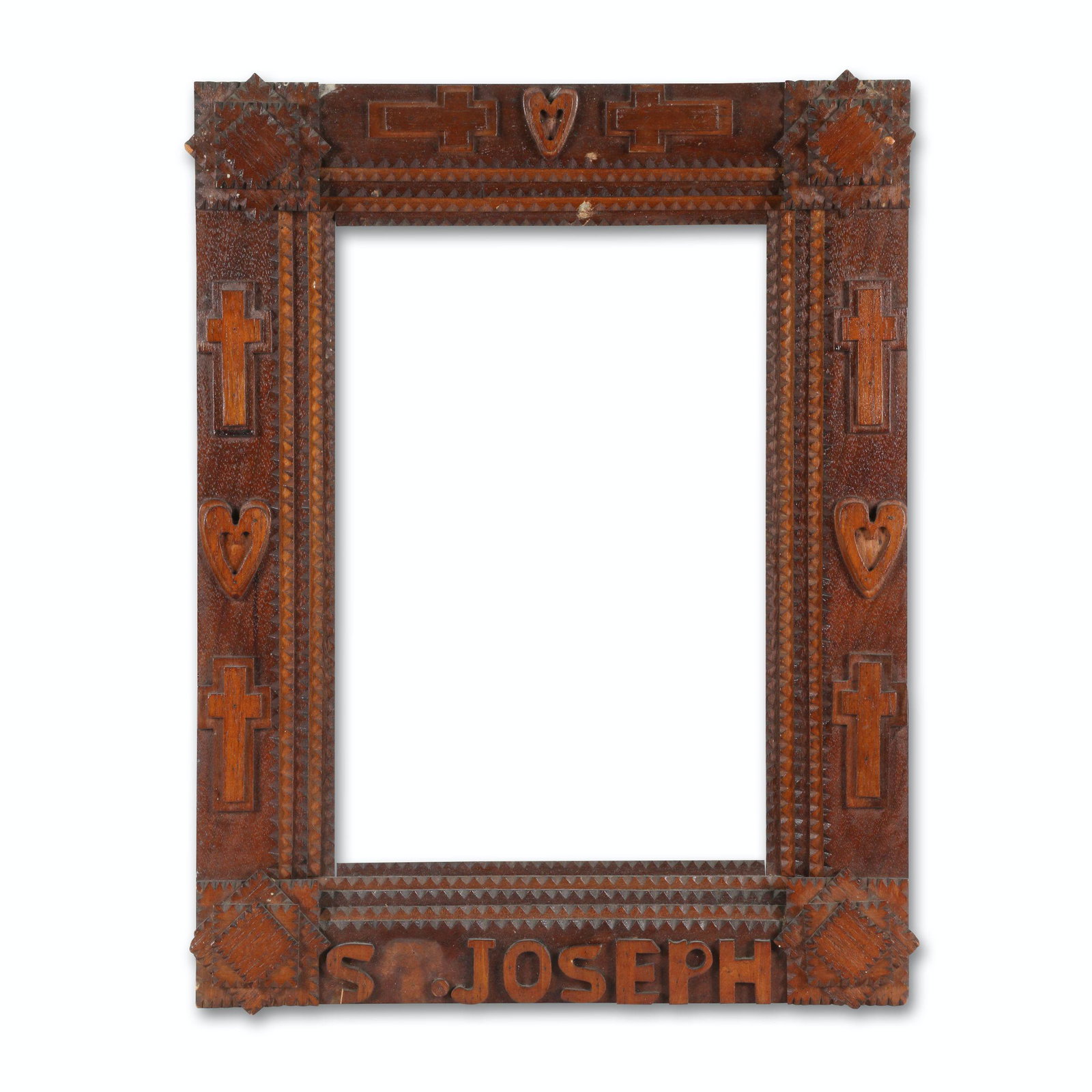 St Joseph Tramp Art Frame: Canadian. 1st quarter 20th C. Carved wood pieces comprise multi-layer crosses and hearts. Original varnish. Requires a "t" in St. Joseph). 22" x 17". Jim/Ilona Fleming Collection. $200/300.