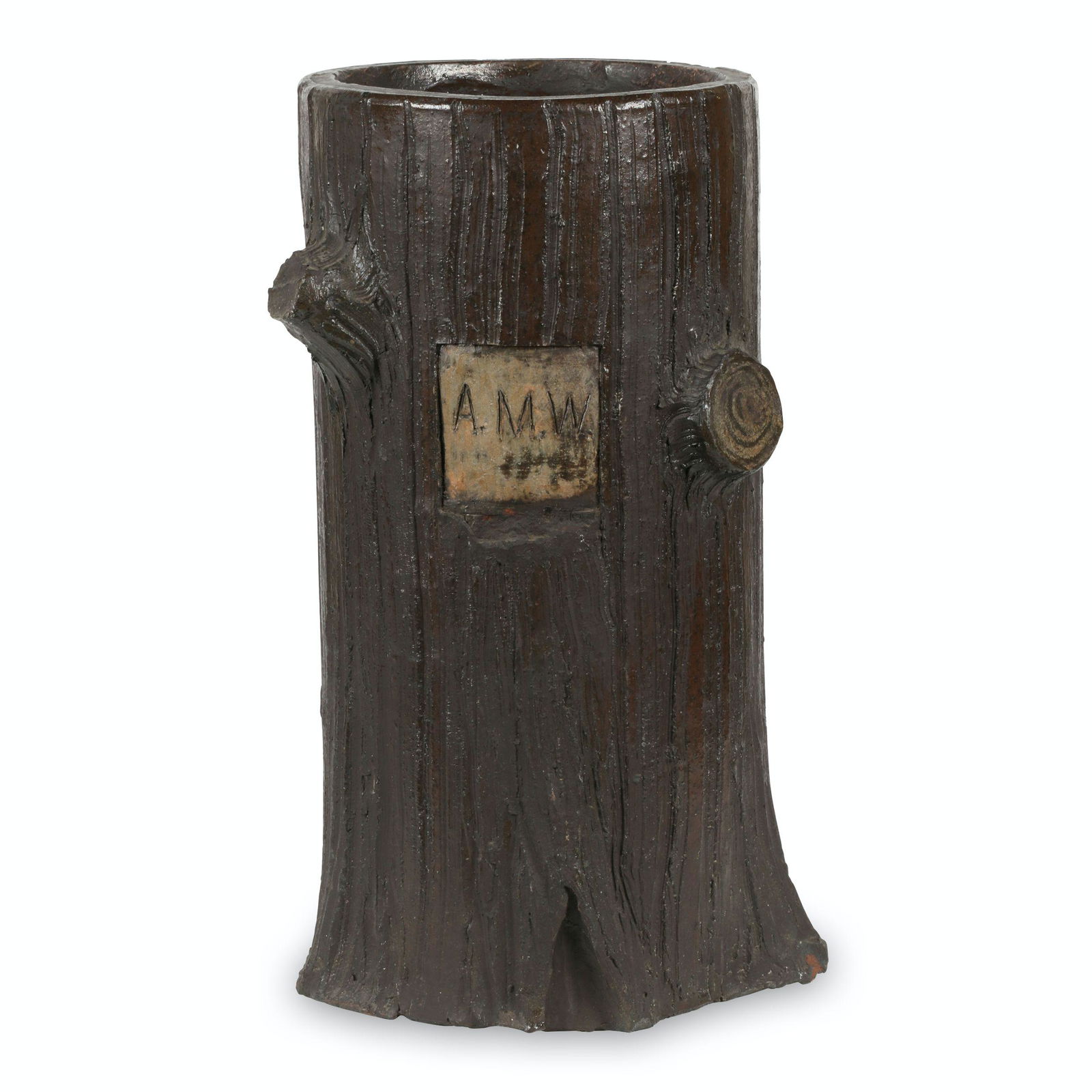 Signed Ontario Redware Sewer Tile Log Stand: Canadian. Earthenware. Incised, in initials "A.M.W" upper side. 21.5" x 11" x 11". Noted, "Huron-Perth Mennonite". Appears to be made from a section of redware sewer tile, overfired with applied mould