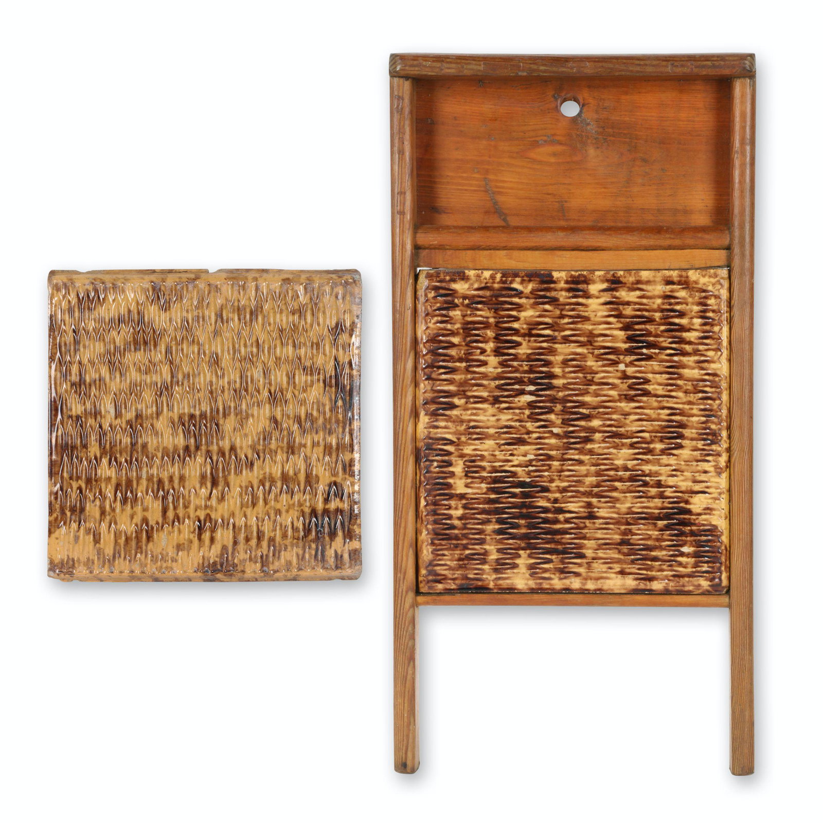 Earthenware Washboards: Probably English. Earthenware. Each features Rockingham glaze. Board 24" x 12" x 2.75". Board noted, "Creemore", loose panel noted, "Seaforth". Loose pottery panel exhibits tight hairline extending 5"