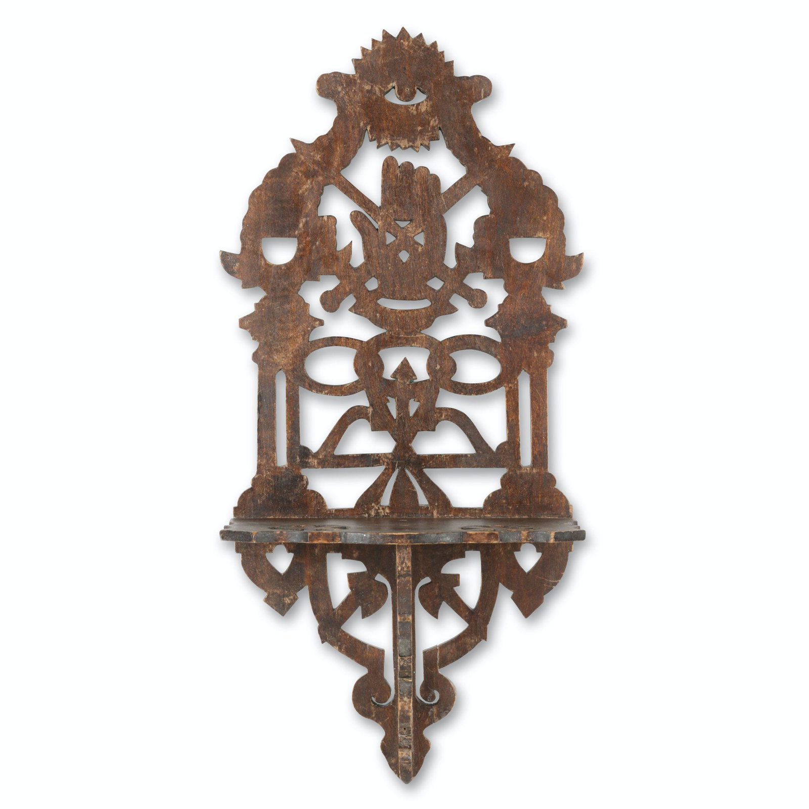 Odd Fellows Folk Art Wall Shelf: Canadian. 1st quarter 20th C. Wood. Featuring cutouts of fraternal Odd Fellows symbols - heart in hand, friendship, love and truth rings. 22" x 11". Jim/Ilona Fleming Collection. $250/400.