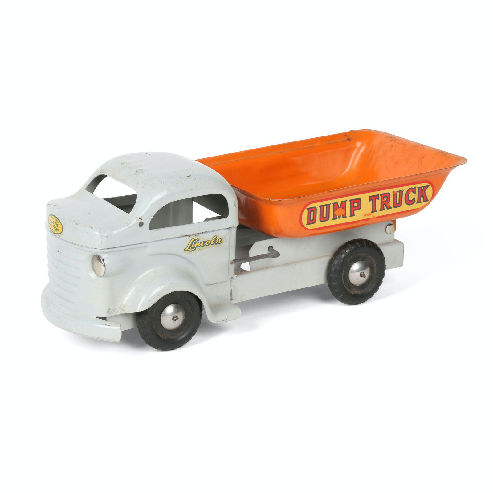 Lincoln Dump Truck Toy: Canadian. 1940s. "Lincoln" transfer on sides and front. Loss to transfers decals. minor oxidation inside bed. no sand box wear on bottom. $200/300