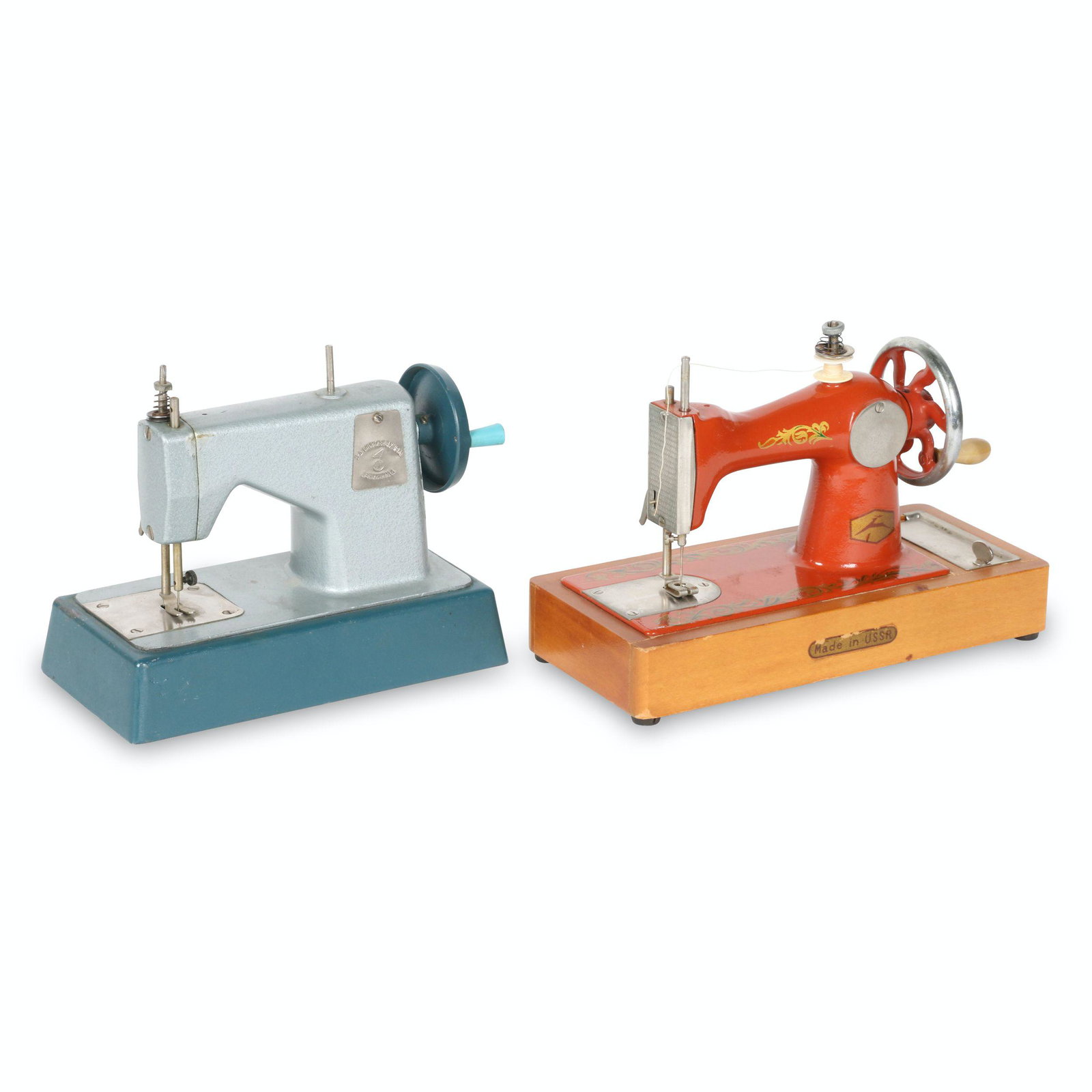 Russian Toy Sewing Machines: Russian. TWO (2) 10â€™ x 4.5” x 6.75”H and 8.5” x 4.5” x 6.75”H These toy machines are both believed to have been made in the USSR. The machines are in condition 8 b