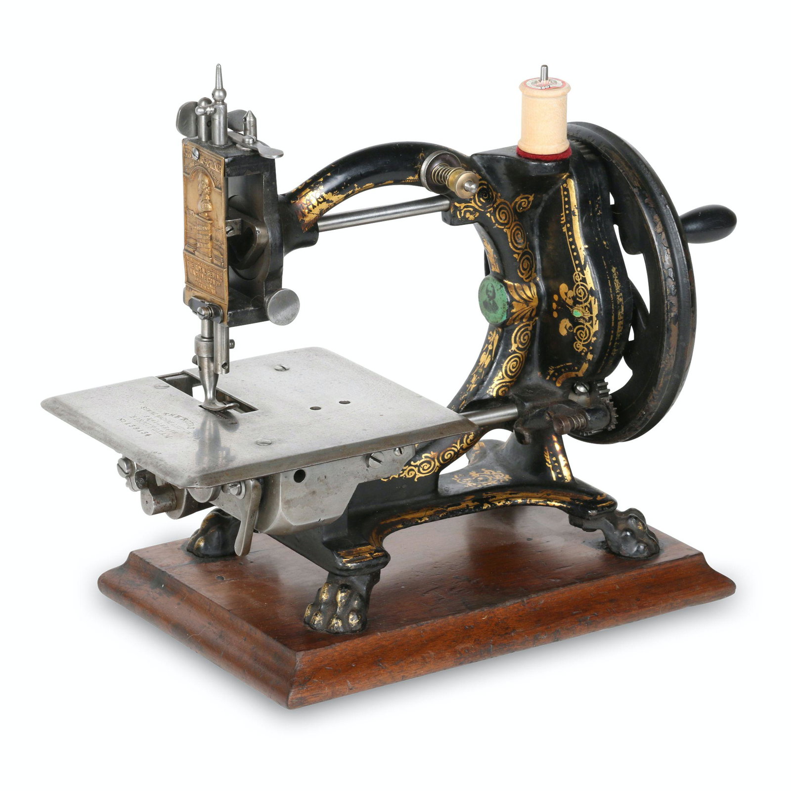 Royal "Shakespeare" Sewing Machine: English. 1870s. The SHAKESPEARE hand crank sewing machine was manufactured by the Royal Sewing Machine Co. Ltd., Smallheath Birmingham England. It has a serial number of 139134. Adorned with a gold fa