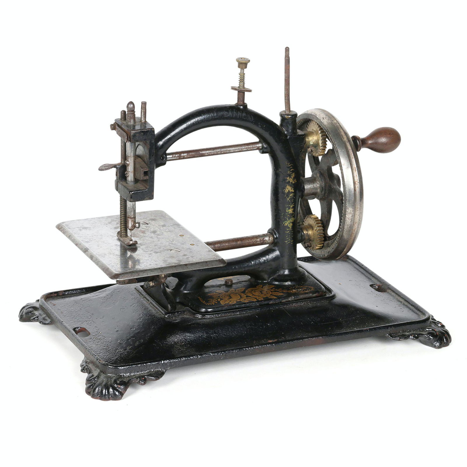 Original Express Sewing Machine: German. 1880s. 13” x 8” x 10”H Cover is 11.5” x 6.5” x 11”H This cast iron machine was manufactured by Guhl & Harbeck, Hamburg, Germany between 1870 and 1920. ORIGINAL MACHINE is stamped o