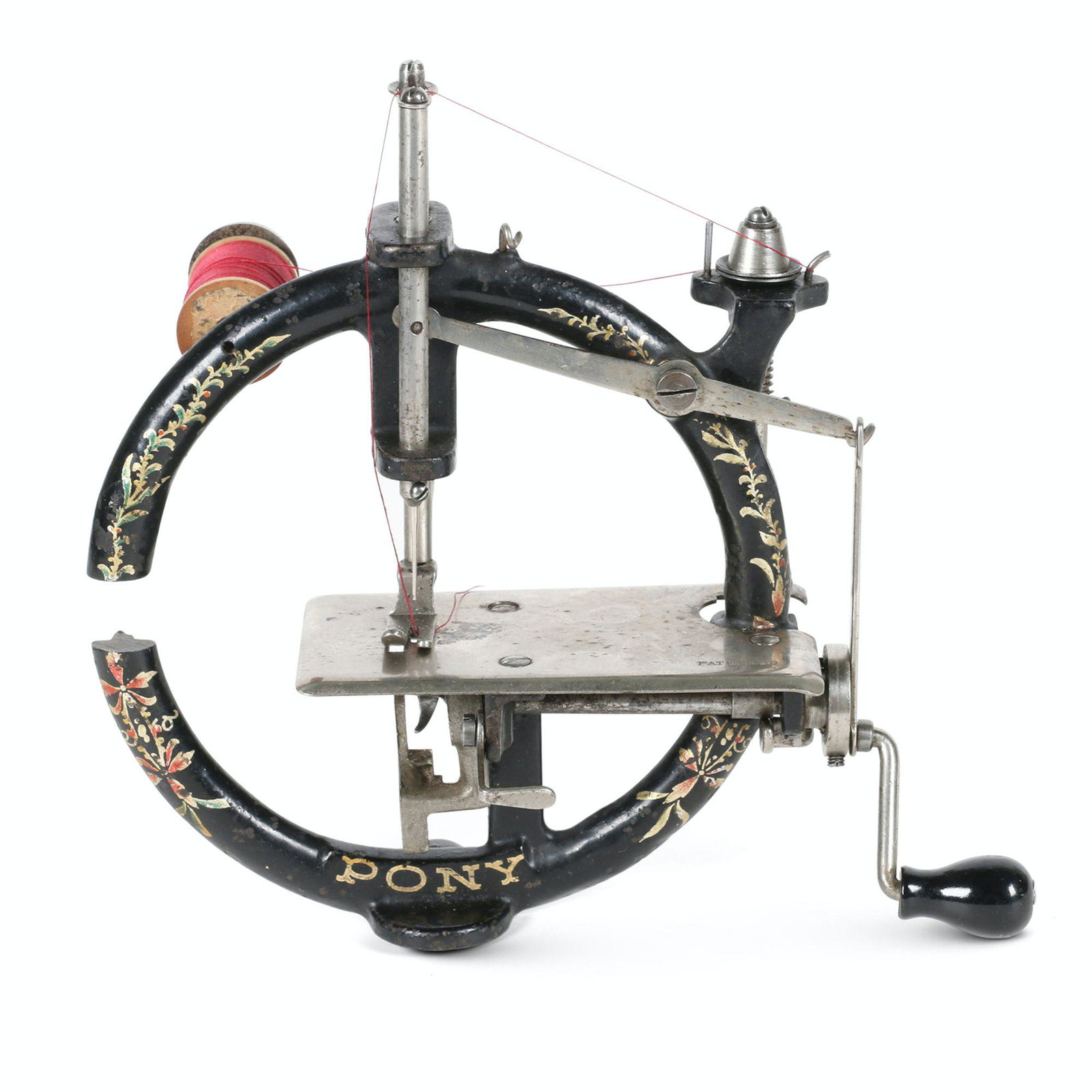 Foley & Williams "Pony" Sewing Machine: American. 1900s. 7.25” x 2.25” x 7.25”H Manufactured by Foley & Williams Co., USA in the early 1900â€™s, this chainstitch machine is occasionally found with approximately 26 - 1