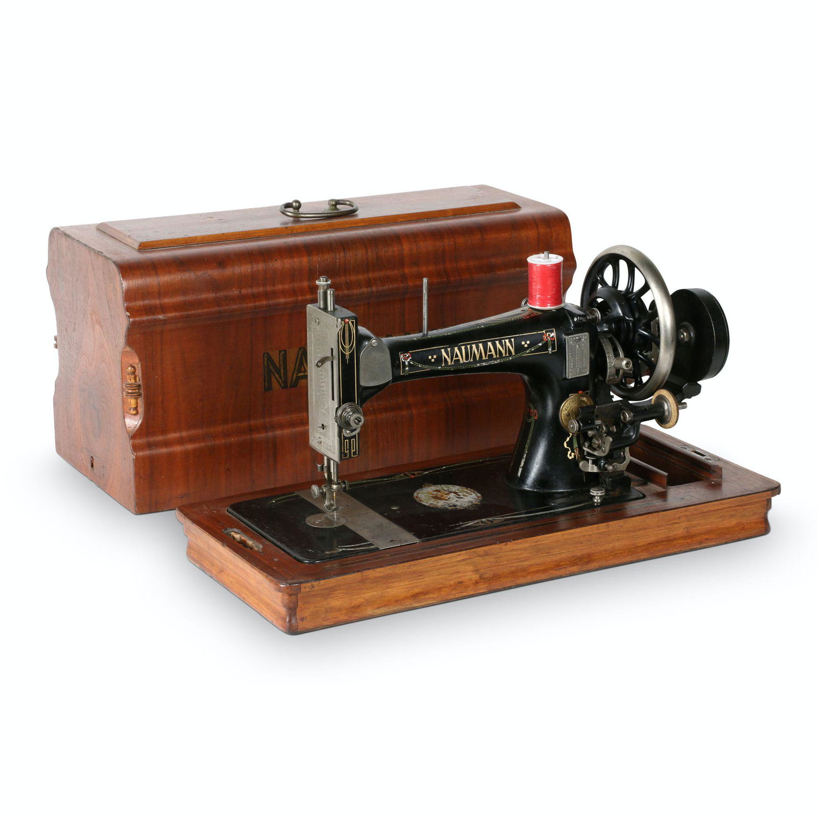 Seidel & Nauman Sewing Machine: German. 1890s. 21.5” x 10” x 13.5”H This portable hand crank machine was manufactured by Seidel & Nauman Co. of Dresden Germany. It is similar in design to the Singer Model 28 machin