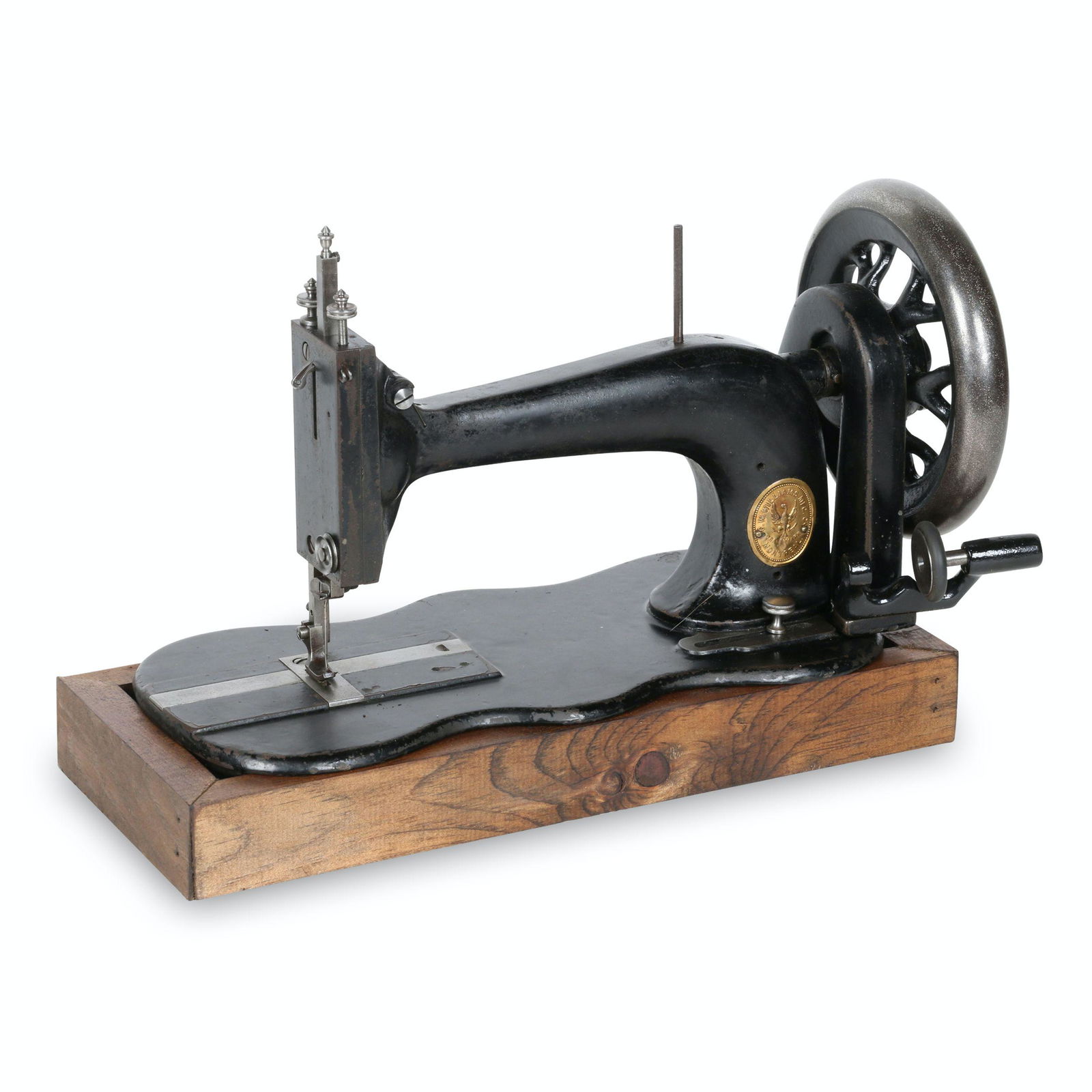 Williams Singer Copy Sewing Machine: Canadian. 1860s. Canadian. 15” x 6” x 10”H This machine was manufactured by C.W. Williams & Co. of Montreal which operated under that name from 1861-1872. The company was re-named Ne