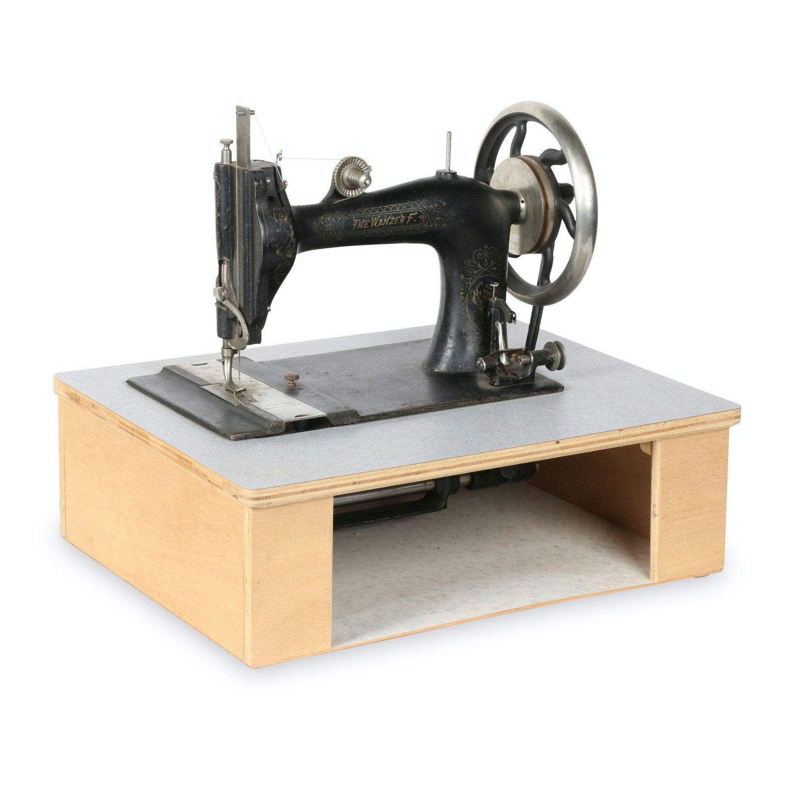 Wanzer Model "F" Sewing Machine: Canadian. 1880s. Canadian. 18.75” x 14.5” x 15.5”H This machine was manufactured by R.M. Wanzer & Co. (1859-1890) in Hamilton, ON. The Wanzer Sewing Machine Co. was very successful a