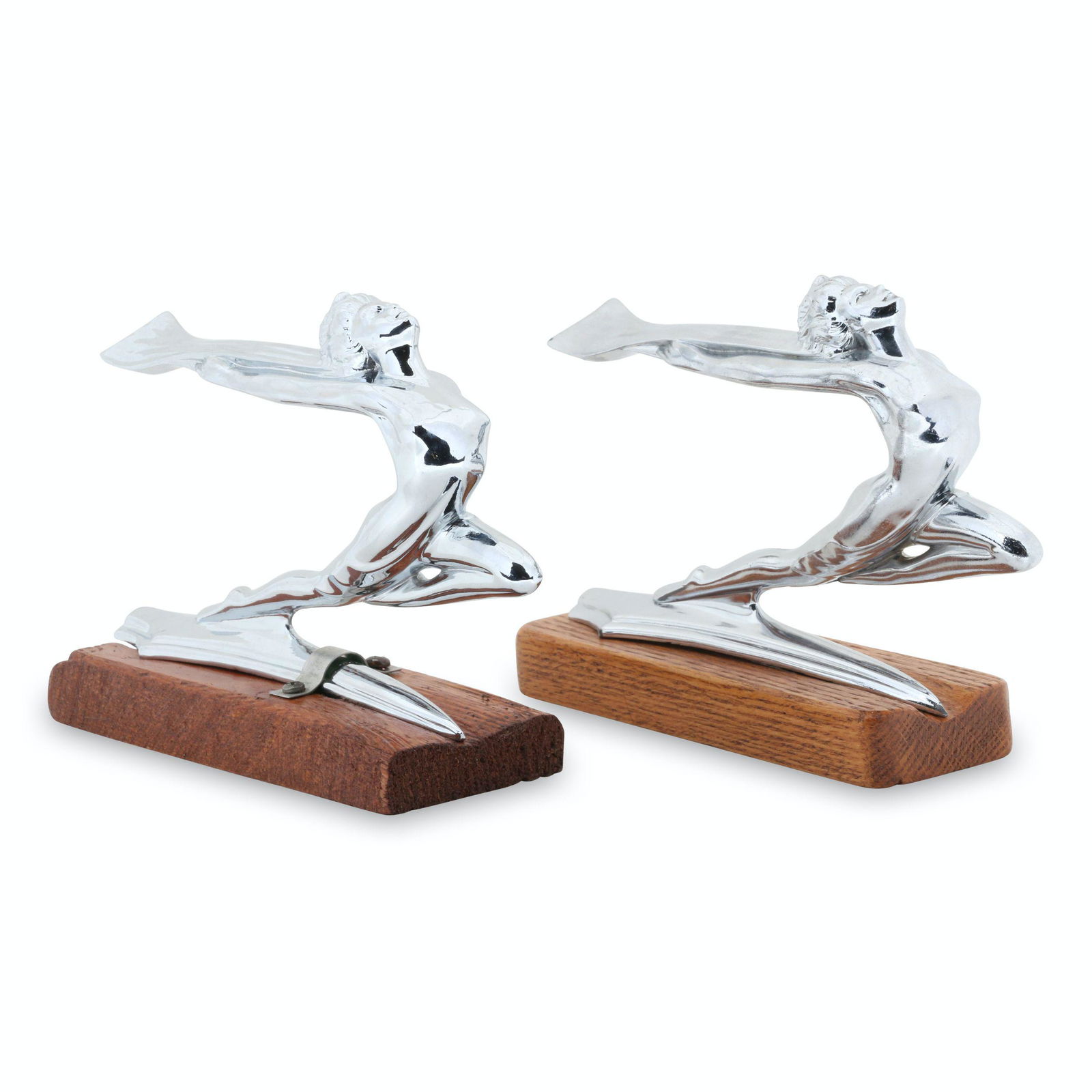 1934-35 Buick Goddess Hood Ornaments: Two (2). American. 1934-35. One marked, "Part-T-29693 - Des Pat - 90750" underside. 6" x 1.75" x 4.5" each. Re-casts. Free of surface pitting and oxidation. $600/800