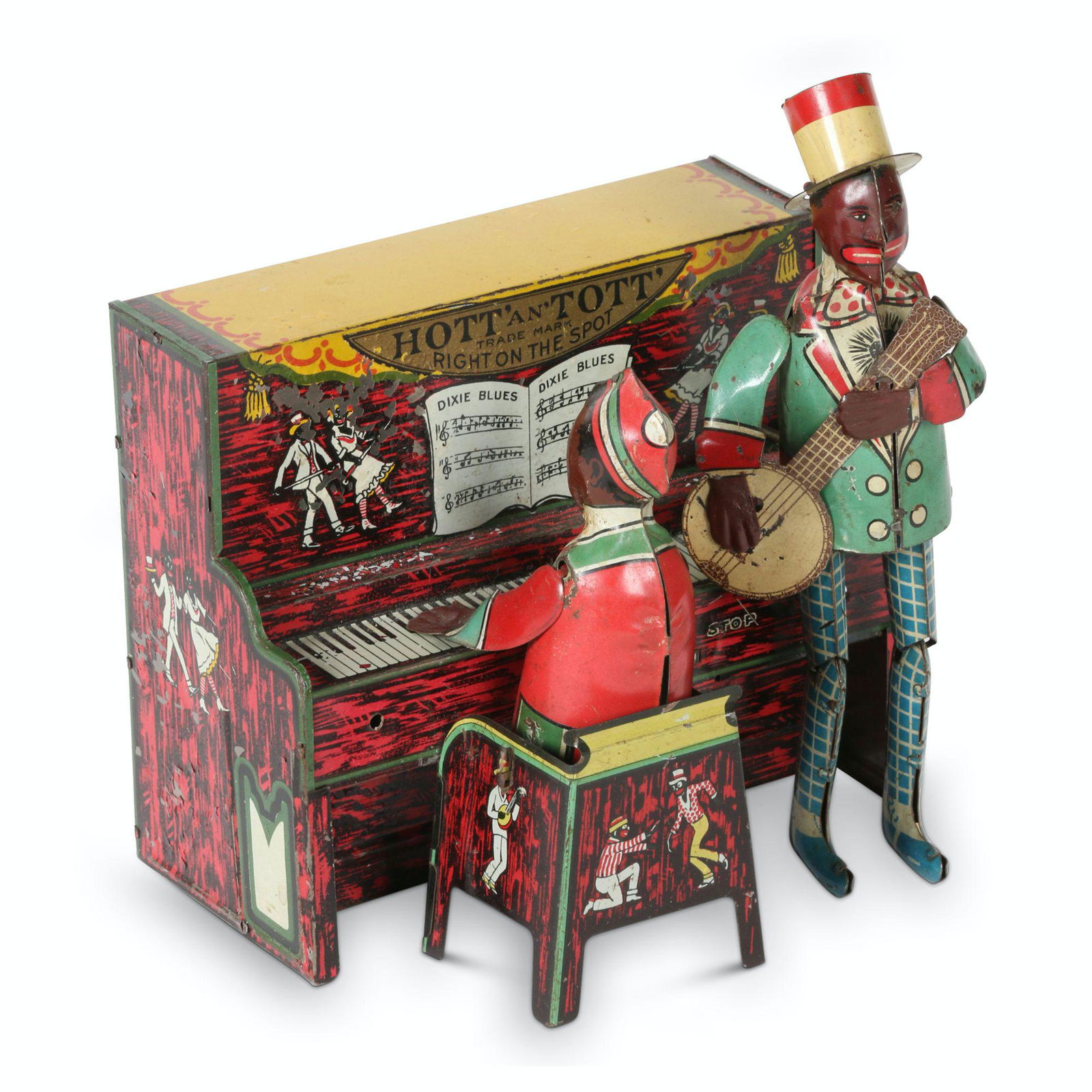 Unique Art "Hott an' Tott" Tin Litho Toy: American. 1930s. Lithographed tin. Marked, "Unique Art Mfg Co. Inc, Newark NJ New York, N.Y Made in USA". "Copyrighted by Unique Art Mfg Co., 1921 Patented Oct. 1921" rear. 7 x 5 x 7.5" (h). Functioni