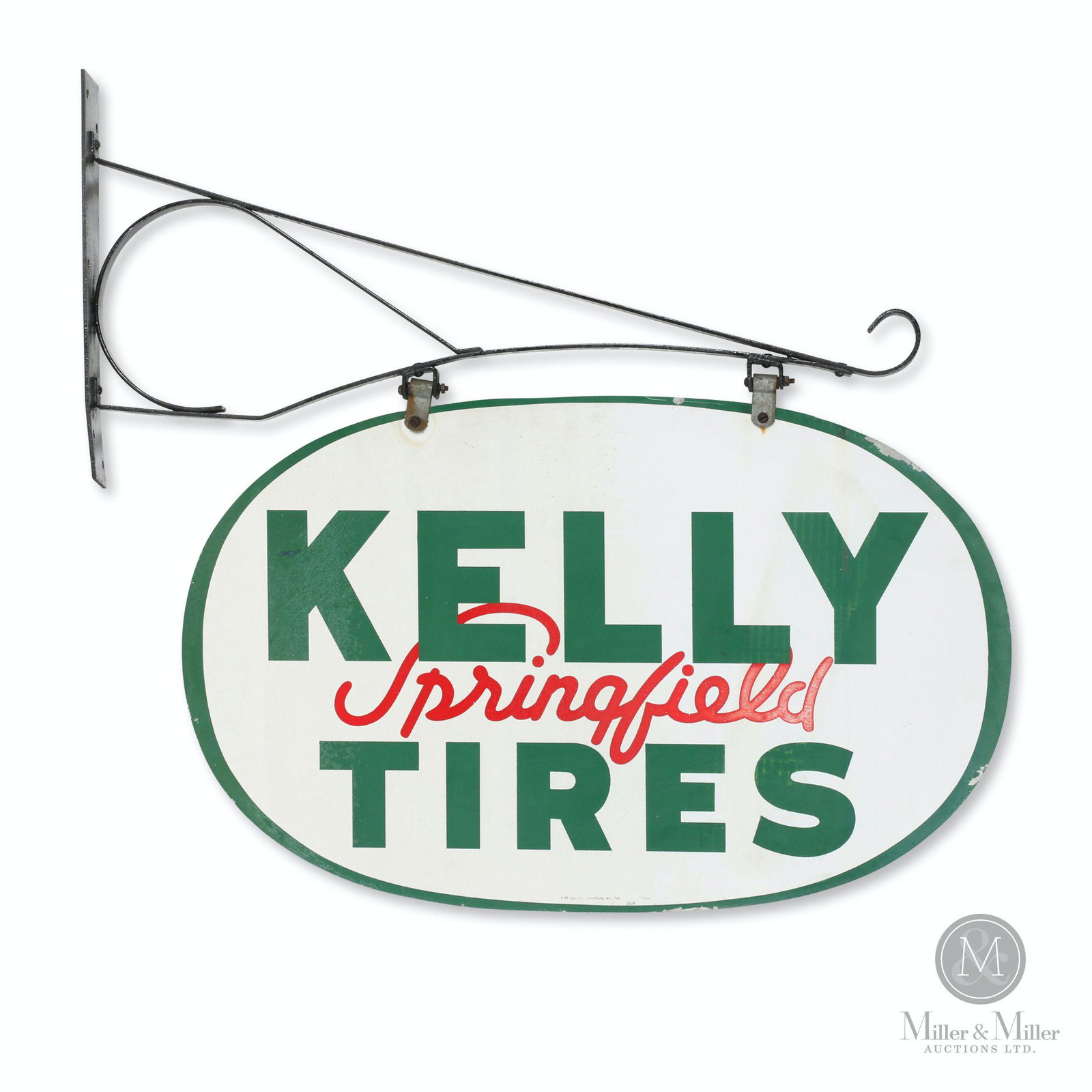 Kelly Springfield Tires Hanging Sign: American. 1947. Painted metal. 2-sided. Includes original iron mounting bracket. Marked, "A-M Sign Co., Lynchburg VA, 7-47" lower edge. 3' x 22". Minor blemishes including surface loss and streaks of 