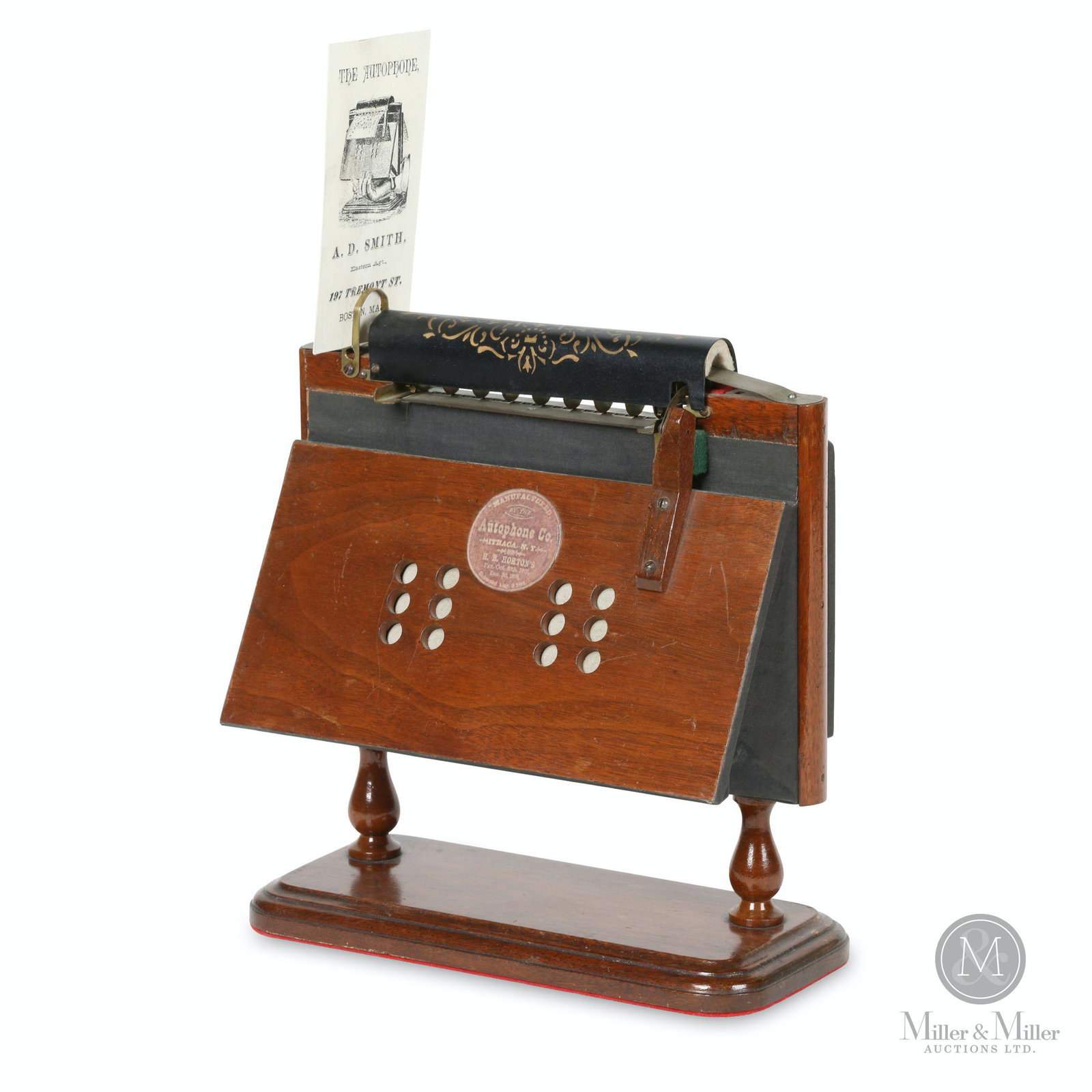 Autophone Portable Scroll Music Box: American. 1880s. Includes re-print of early advertising trade card. Decal marked, "Manufactured by the Autophone Co., Ithaca, N.Y. - H.B Horton's Patent Oct 8, 1877, Dec 30, 1878 - Redesign Aug 9th, 1