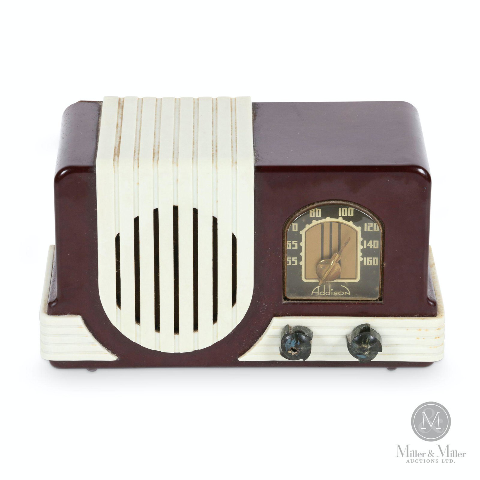 Addison Model L2 Tube Radio: Canadian. 1940s. Bakelite case, grille and trim. Catalin knobs. Features classic art deco design with waterfall grille and pinwheel knobs. Marked, "Addison Industries, Toronto, Canada Model L2 Serial 
