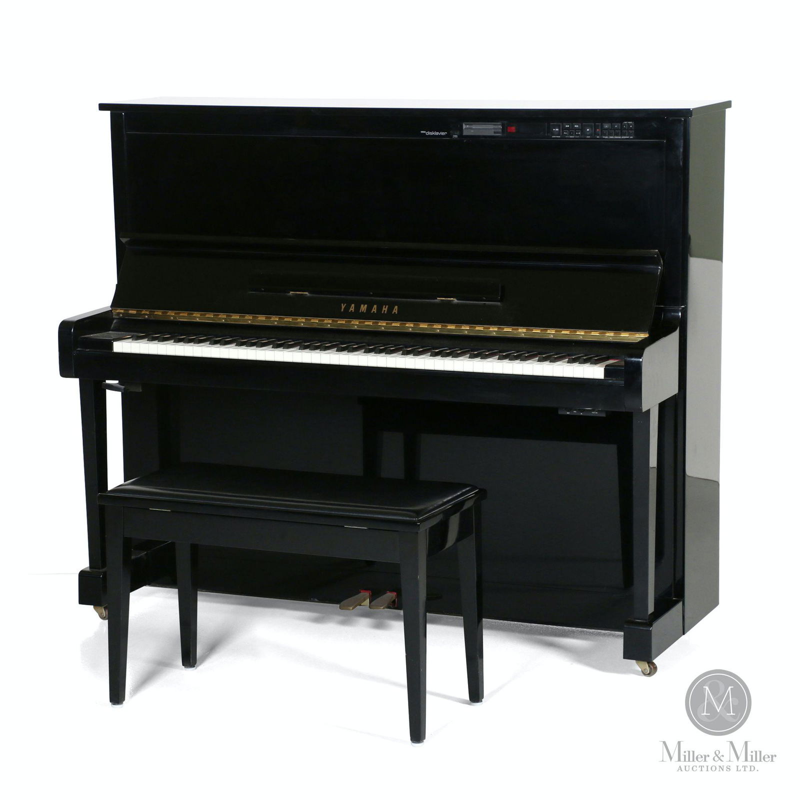 Yamaha Disklavier Upright Player Piano: Japanese. 1980s. Includes a library of music discs. This machine not only operates like an old player piano, but it also records what is physically played via the keyboard. 58 x 23 x 49.5". Ken Vinen