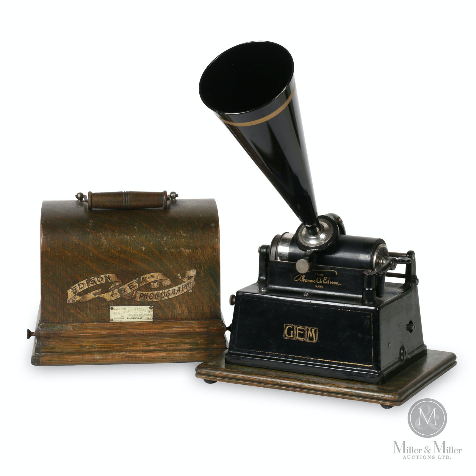 Edison "Gem" Phonograph: American. 1902. Includes music cylinder. Original quarter-sawn oak lid. Cover tagged, "R.S Williams & Sons, Toronto". 10 x 7.5 x 9". Reproduction horn. Ken Vinen collection.