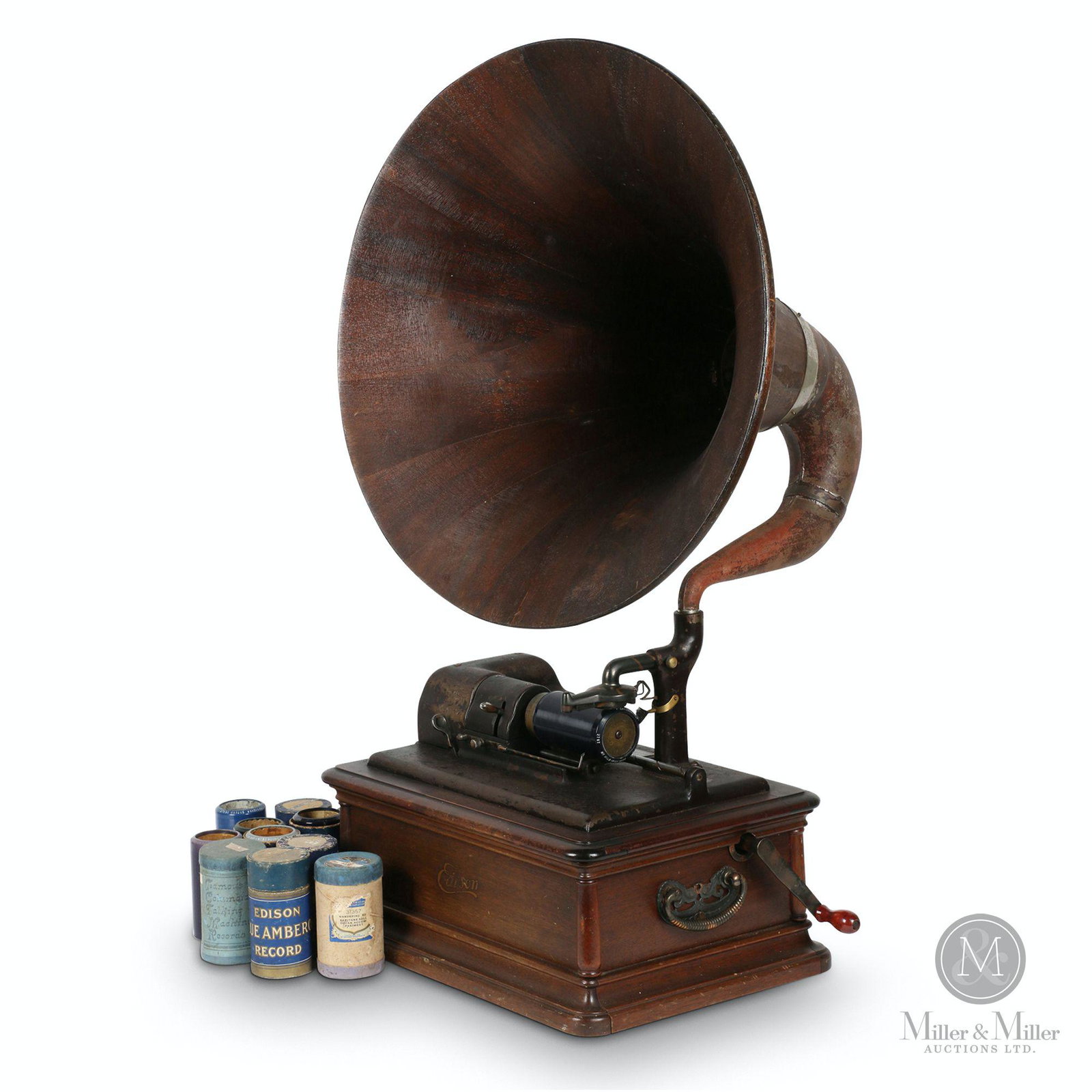 Edison Opera Phonograph: American. 1920s. An original, untouched example. Includes 10 4-minute cylinders. Edison â€œOpera” plate stamped serial â€œ138 - SM - A”. Mahogany horn retains â€œMusic Master C