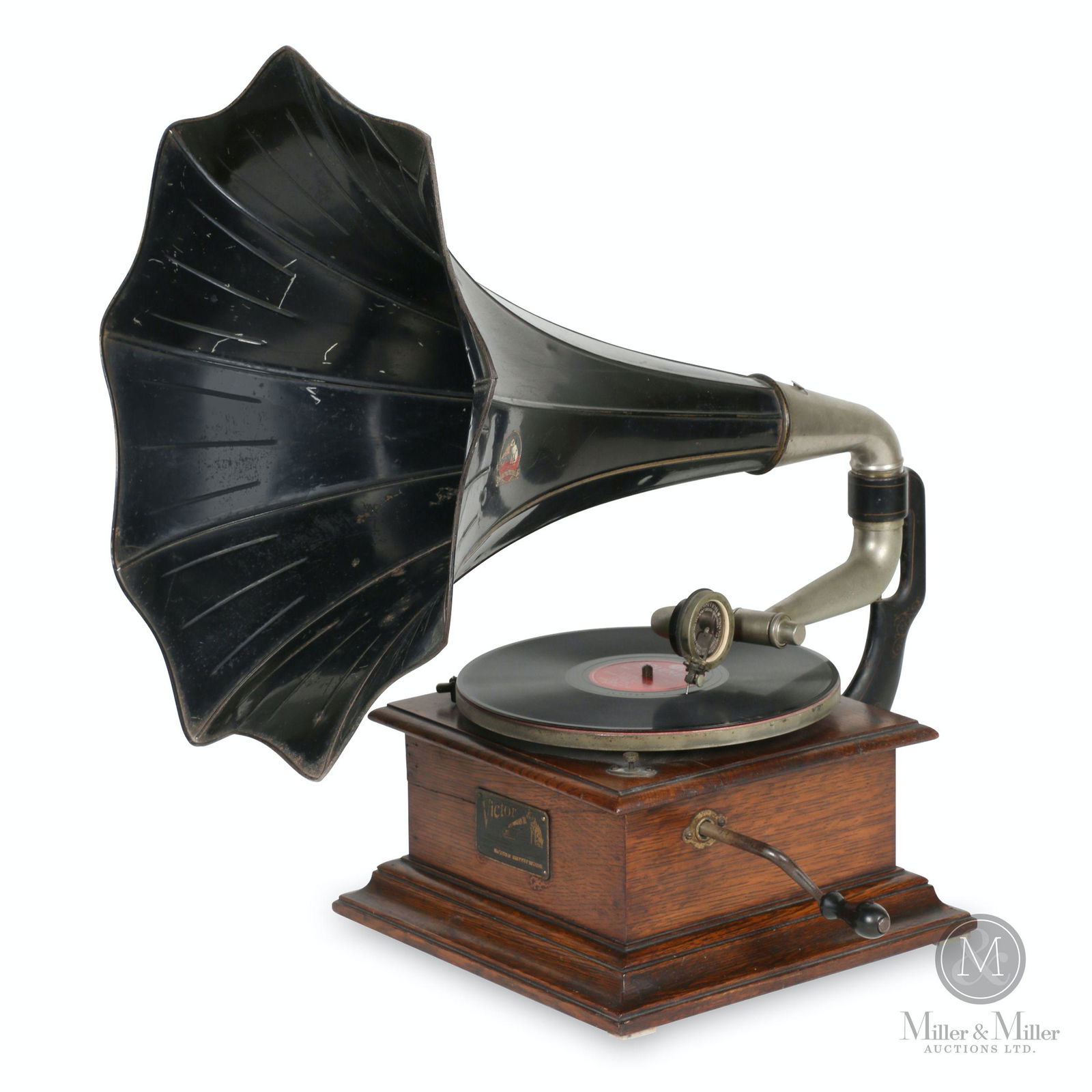 Victor Model VIC-1 Gramophone: American. 1907-1908. Oak case. Includes a 78 RPM record. Last variation. Plate stamped, "Victor, Style "VICI" 14424C". 22 x 21 x 23"; Horn 20 x 17". Split through front side of case. Ken Vinen collect