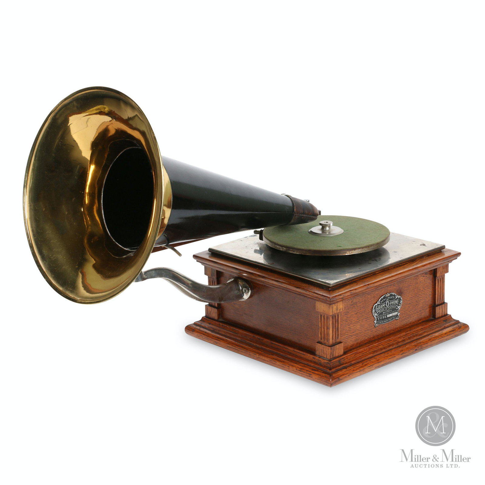 Berliner Model B Gramophone: Canadian. 1900s. Quarter-sawn oak case. Crown badge stamped, "Berliner GRAM-O-PHONE Co. of Canada Ltd. Type B635 Montreal Pats. 55078 & 55079 Feb 24, 97". Reproducer stamped, "J 1371". Cabinet 11.25 x