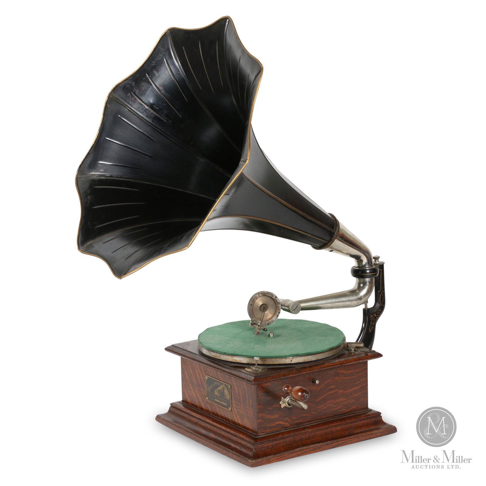 Berliner Model AT Gramophone: Canadian. 1910s. Quarter-sawn oak case. Scissor tone arm. Case badge stamped, "GRAM-O-PHONE Made by Berliner Gram-o-phone Company Limited, Type AT - 1651 Pat. 1893, 1903, 1907 Montreal, Canada". Horn 