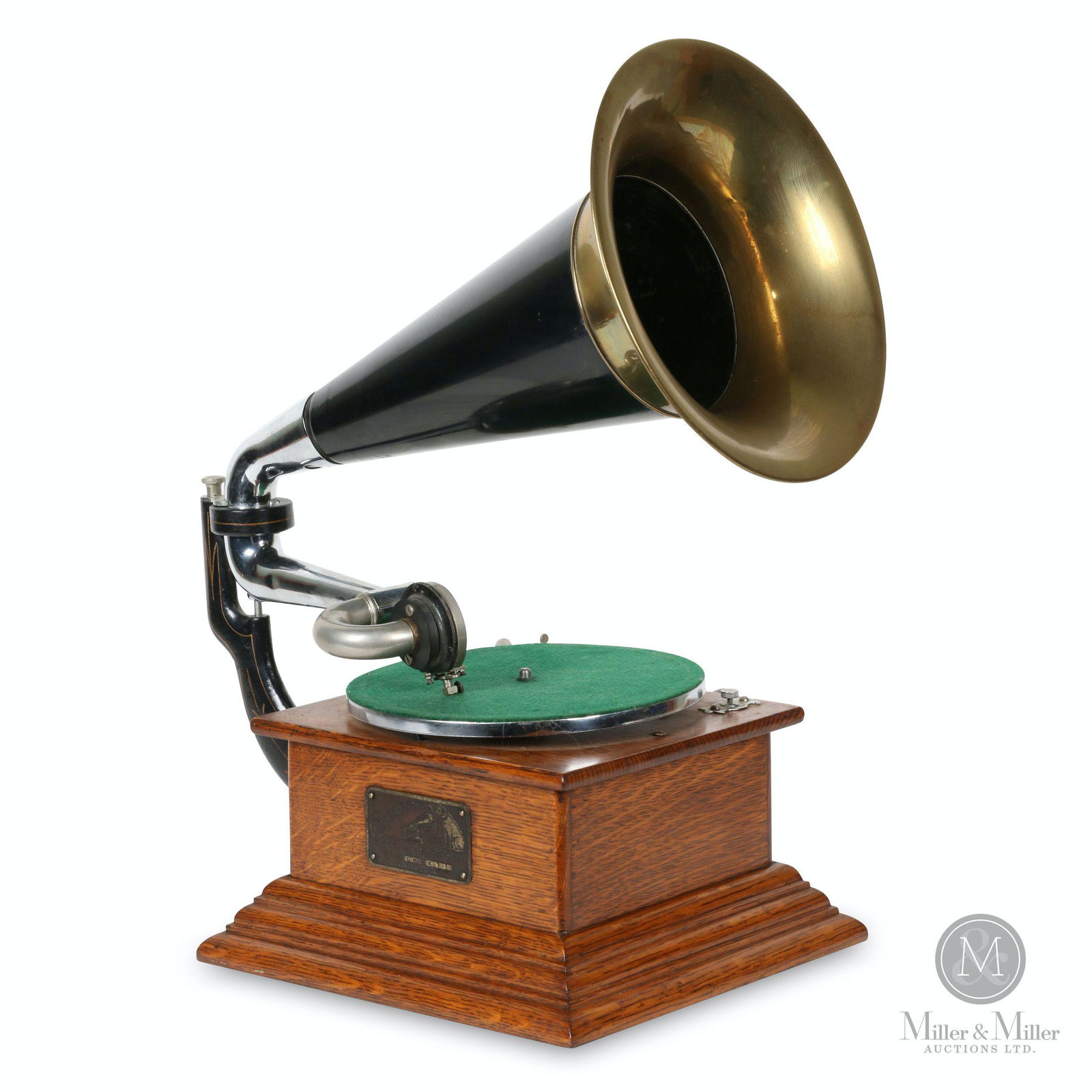 Berliner Model LT Gramophone: Canadian. 2770. Quarter-sawn oak case. Exhibition reproducer. Smallest Canadian Berliner rear-mount. Received 1st Place ribbon from the Michigan Antique Phonograph Society. Case badge stamped, "GRAM-O