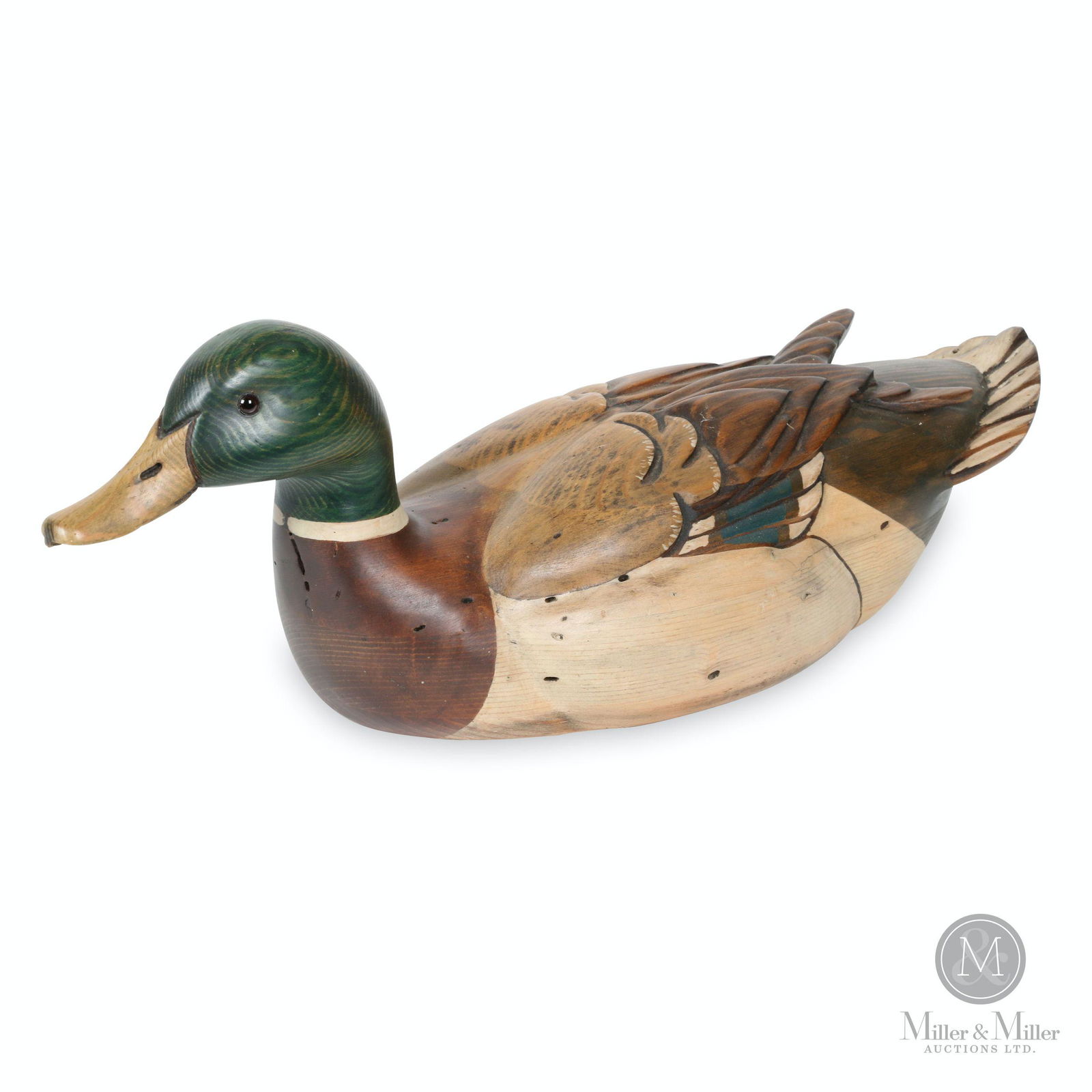 Tom Taber Decoy: American. 1990s. Carved and painted wood. Signed, "Tom Taber" underside. 21 x 6.5 x 7.5" (h).