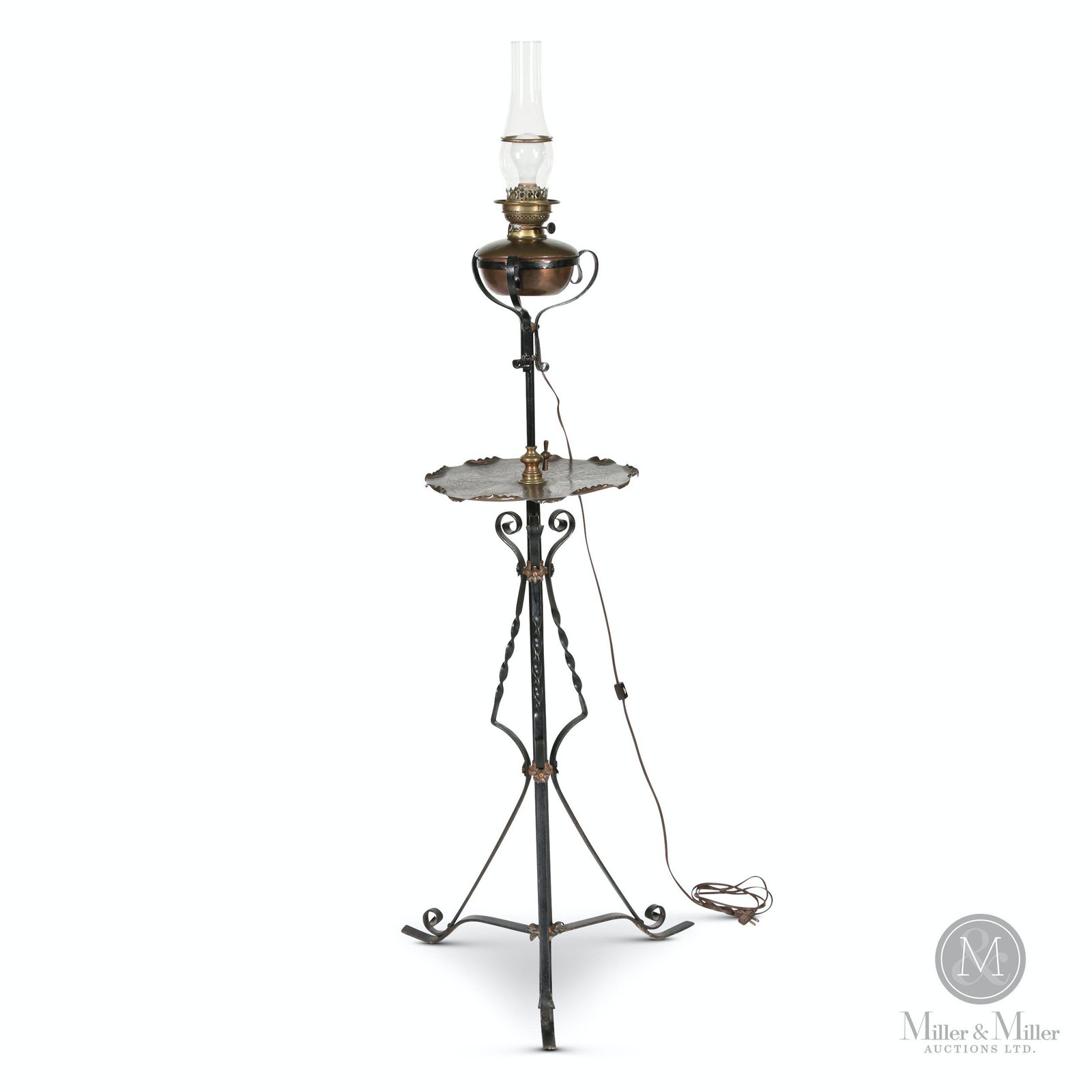 Arts & Crafts Piano Banquet Oil Lamp: American. 1910. Brass and wrought iron composition. Tray 14.5" diameter, Height adjustable from 58 to 87". Electrified burner. Requires ball shade. Thumb screw cracked. CODE-LAM