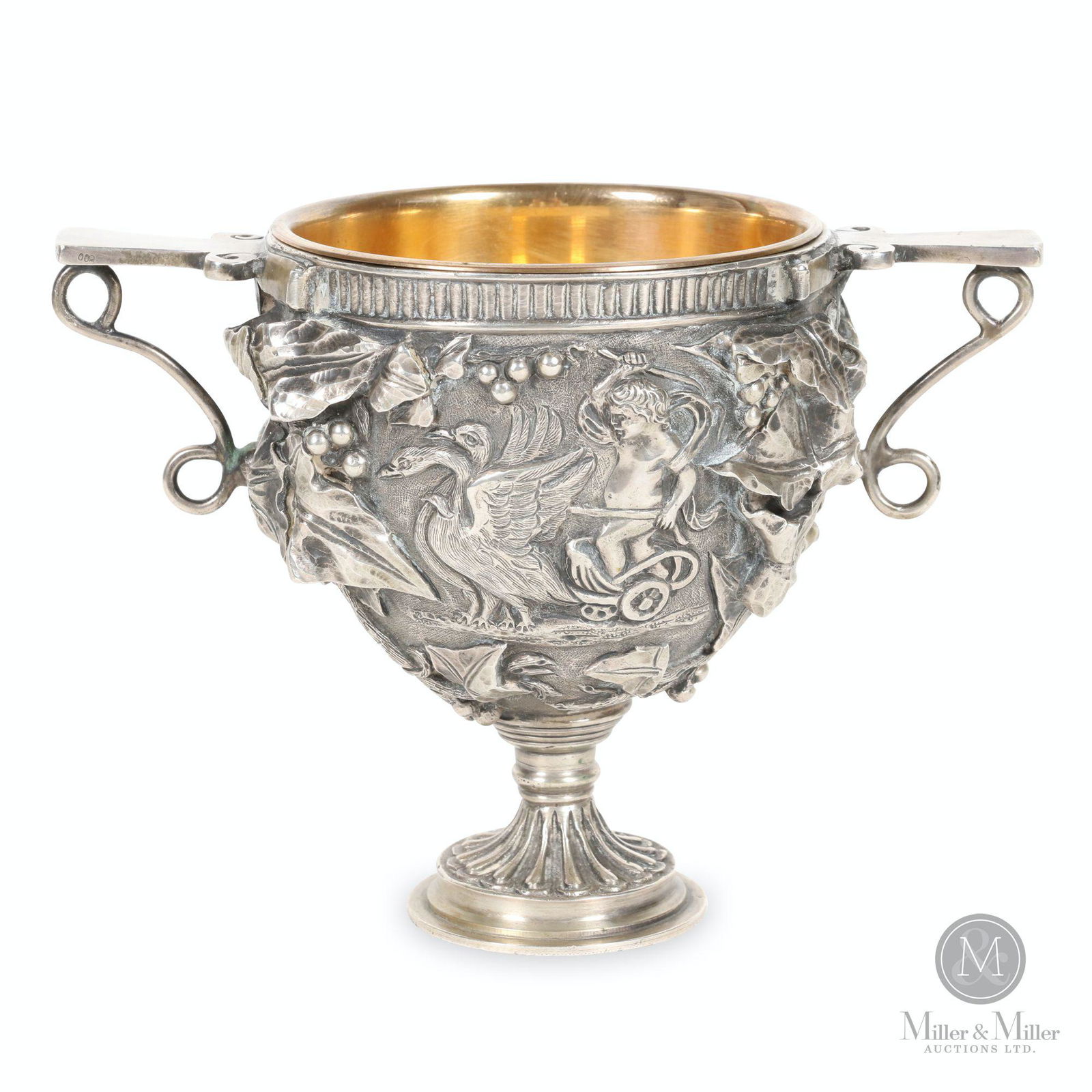Mario Buccellati, Sterling Silver Kantharos Cup: Italian. 20th century. Sterling silver with gilt bronze insert. Lived from 1891-1965. 1260g gross weight. Hallmarked, "900" each handle. 7.5 x 4.25 x 5.5" (h). CODE-SIL