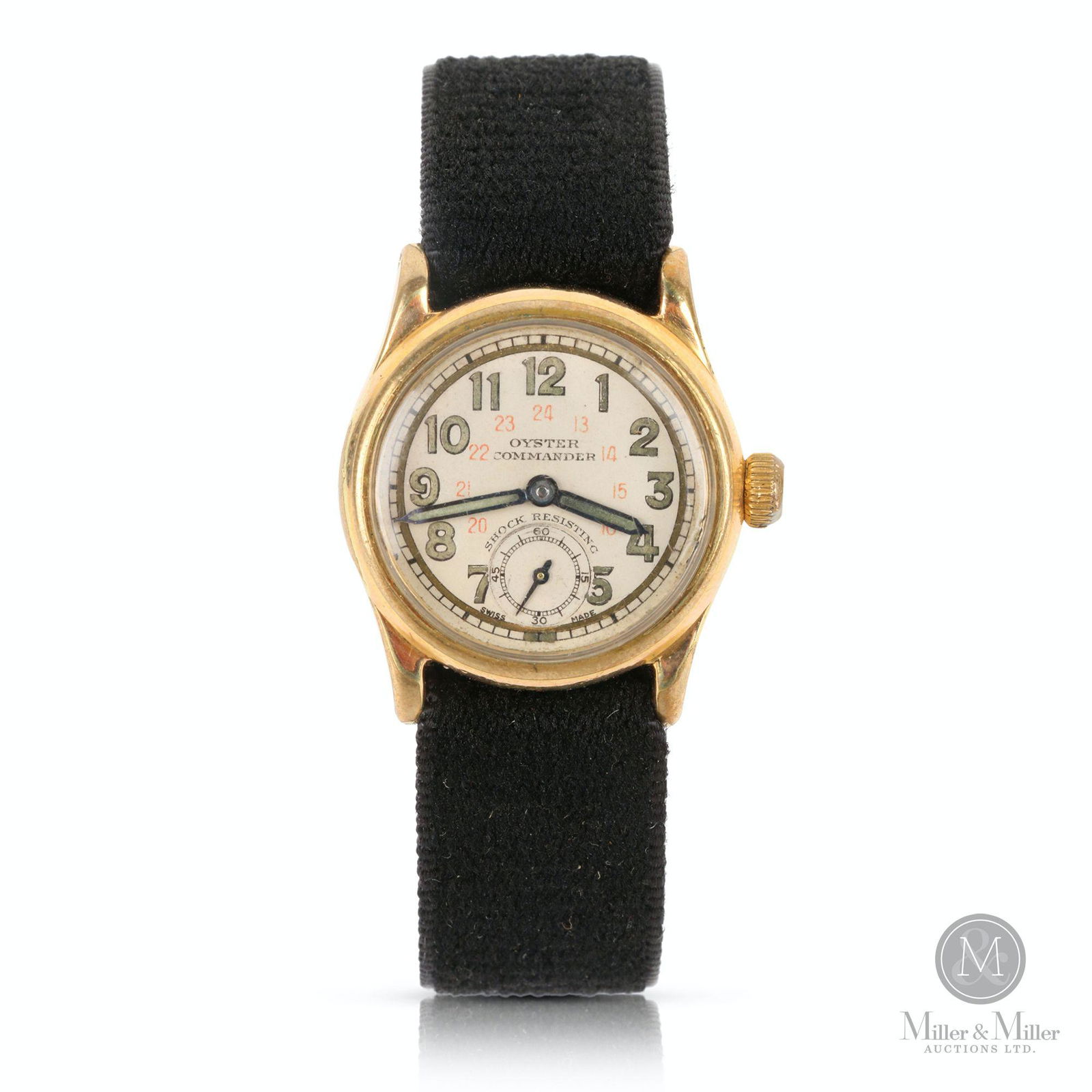 Rolex Oyster Commander Wristwatch: Swiss. 1940s. Gold-Filled. WWII Canadian market "24-Hour" dial. Rolex "Oyster" "OYSTER COMMANDER SHOCK RESISTING SWISS MADE". 1.25". Very Good. Dial exhibits minor fading. Case is worn through to base