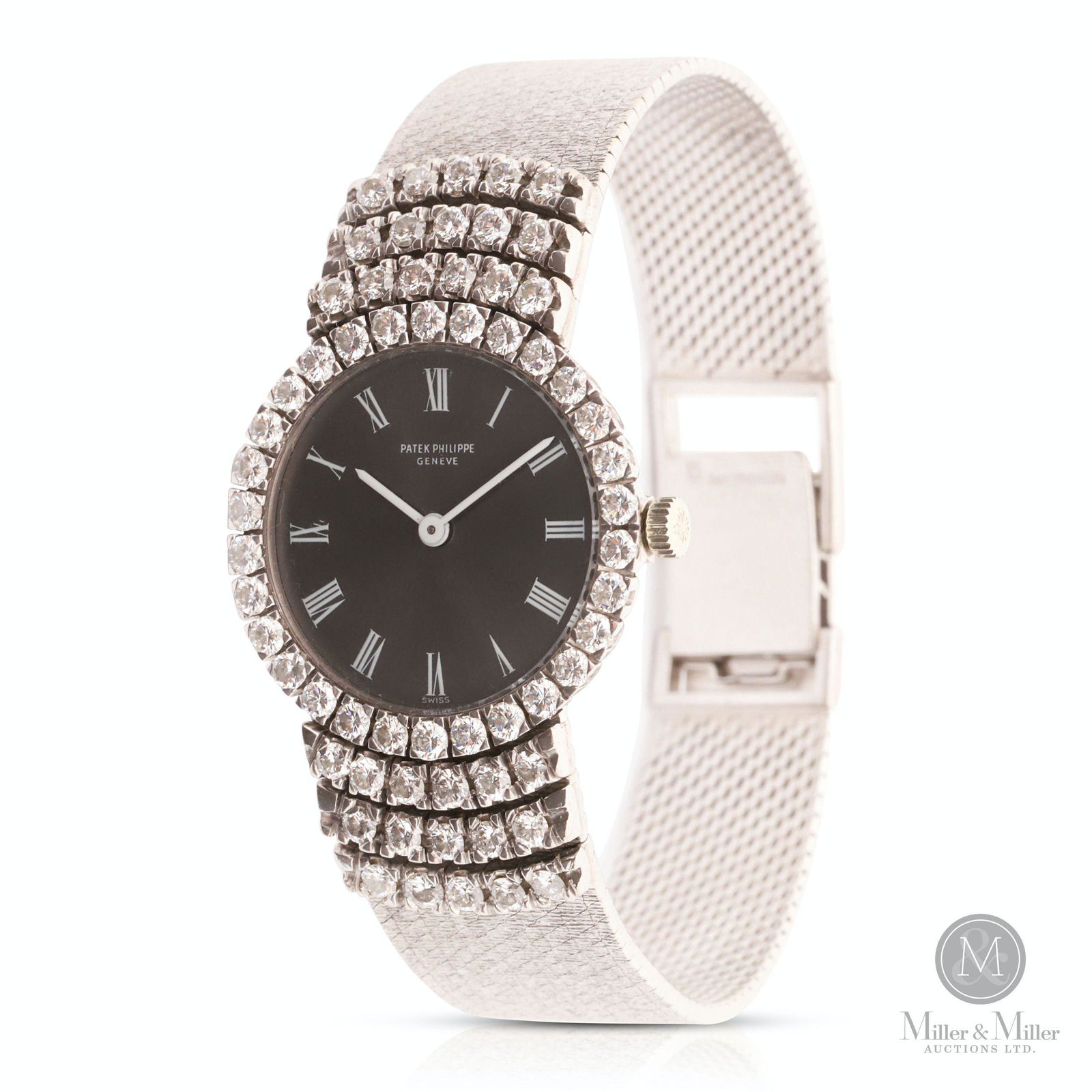 Patek Philippe, 18K & Diamond Ladies Calatrava: 18K White Gold. With its pure lines, the Calatrava is recognized as the very essence of the round wrist watch and one of the finest symbols of the Patek Philippe style. Weight: 59.00g gross. Bezel and