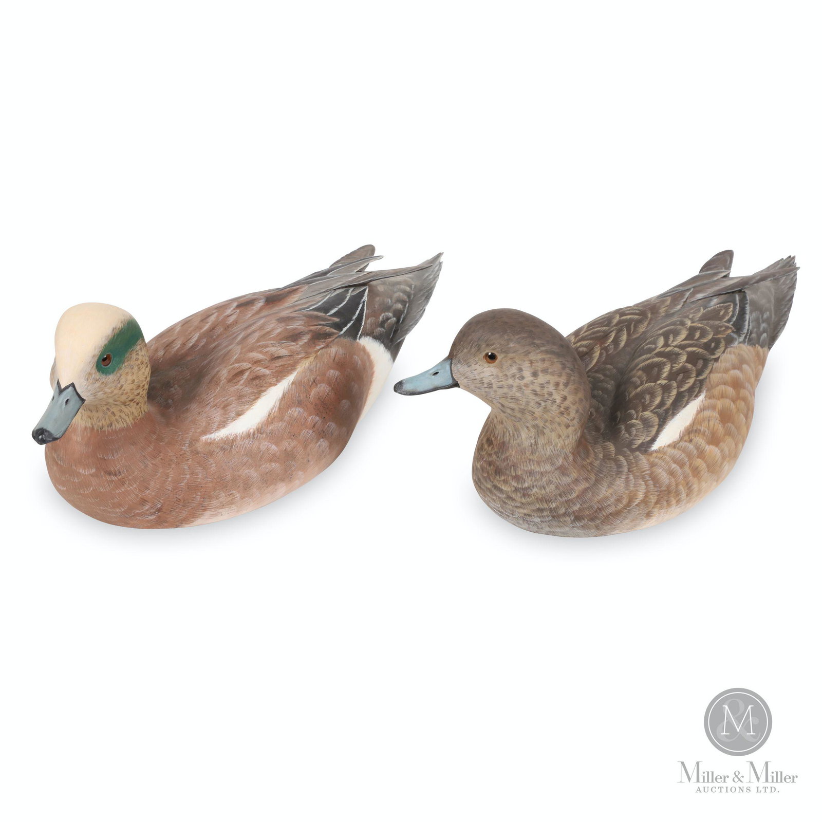 Ian Crokam, Baldpate (Widgeon) Hen & Drake Decoys: Two (2). Canadian. 1987. Painted carved basswood. Each marked, "The Call of the Loon Decoys Ltd., Shanty Bay, Ontario, Ian & Joanne Crokam". 14.5 to 15.5" (l). CODE-DCOY