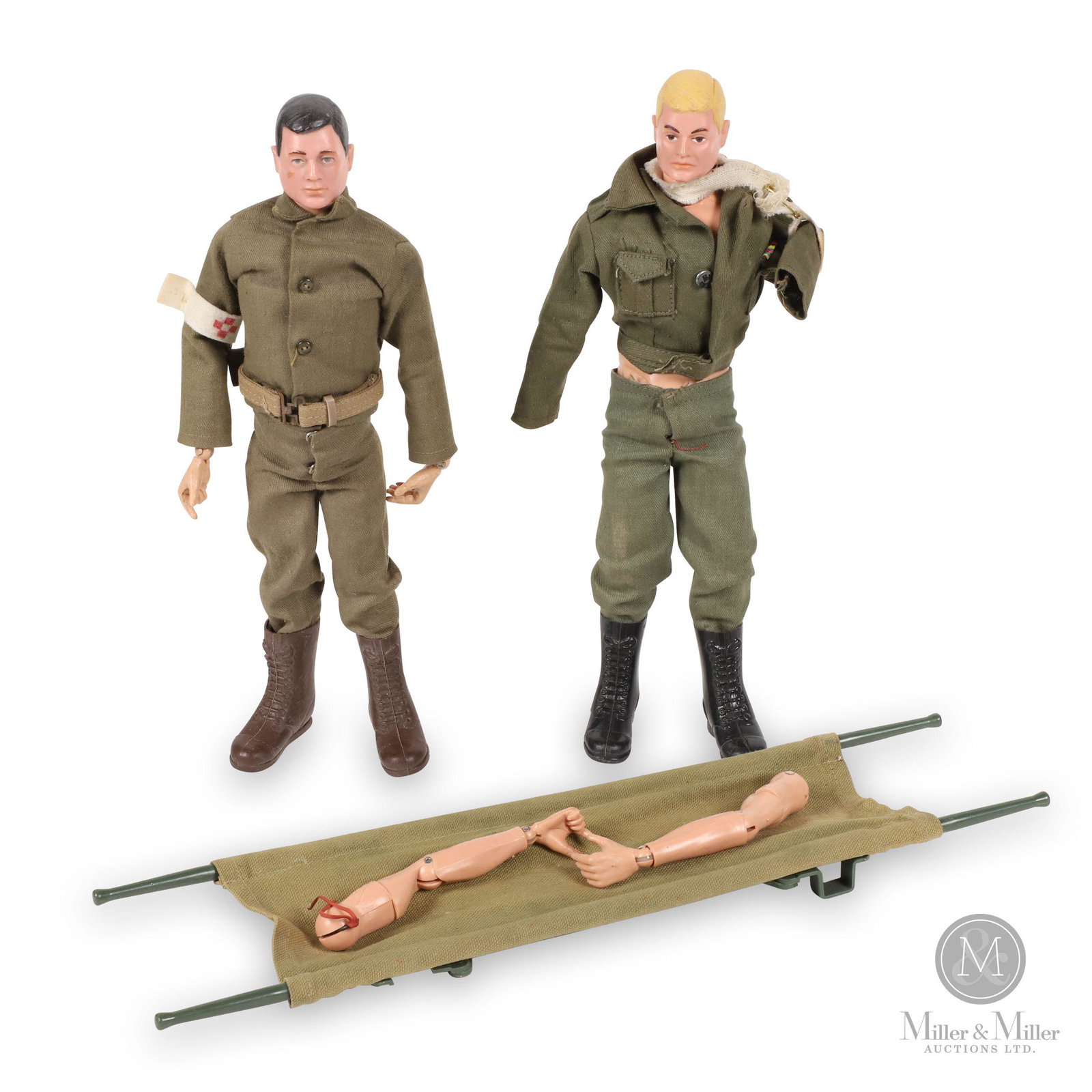 Hasbro GI Joe Action Figures: Two (2). American. 1960s. Plastic, rubber. Includes two dressed figures, stretcher accessory. Figures 11.5" (H). Arms detached from one figure.