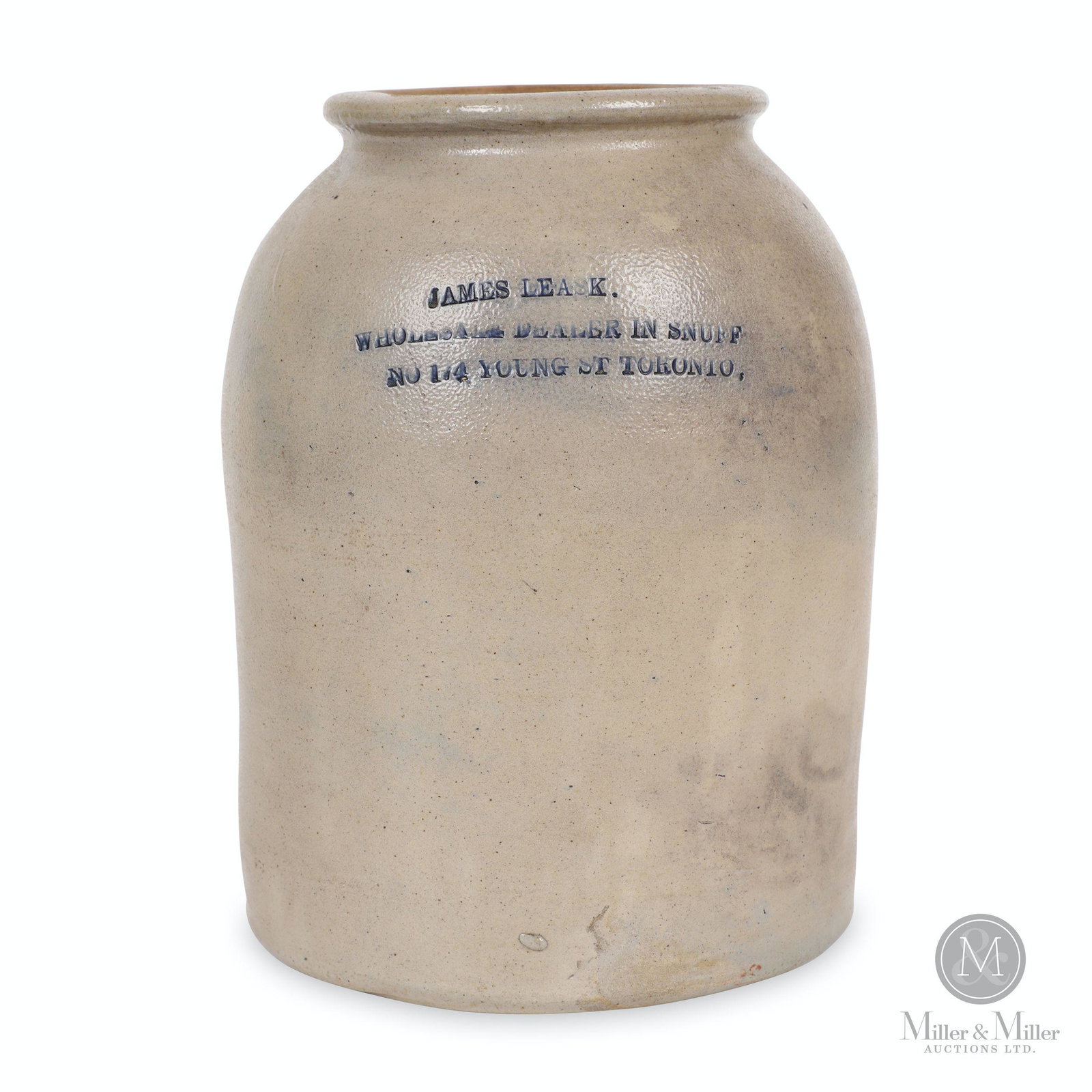 Leask, Toronto 1/4 Gallon Snuff Stoneware Storage Jar: Canadian. 1870s. Stoneware. Stamped, "James Leask, Wholesale Dealer in Snuff / No. 174 Young St., Toronto". 9.5 x 7" (diam). Exhibits two minor base edge flakes.