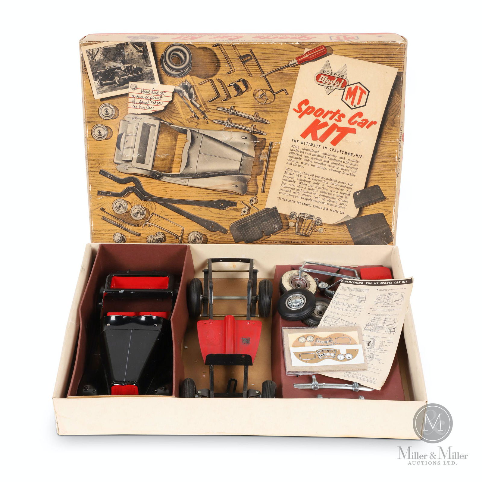 Boxed Charles Doepke MG Toy Car: American. 1950s. Die-cast metal. In original graphic box. Marked, "Model Toys, Rossmoyne, Ohio U.S.A" inner trunk, "Doepke Model", tires. Box marked, "Model No. 2017". Box 22 x 15 x 3.5"; Car 16 x 6 x