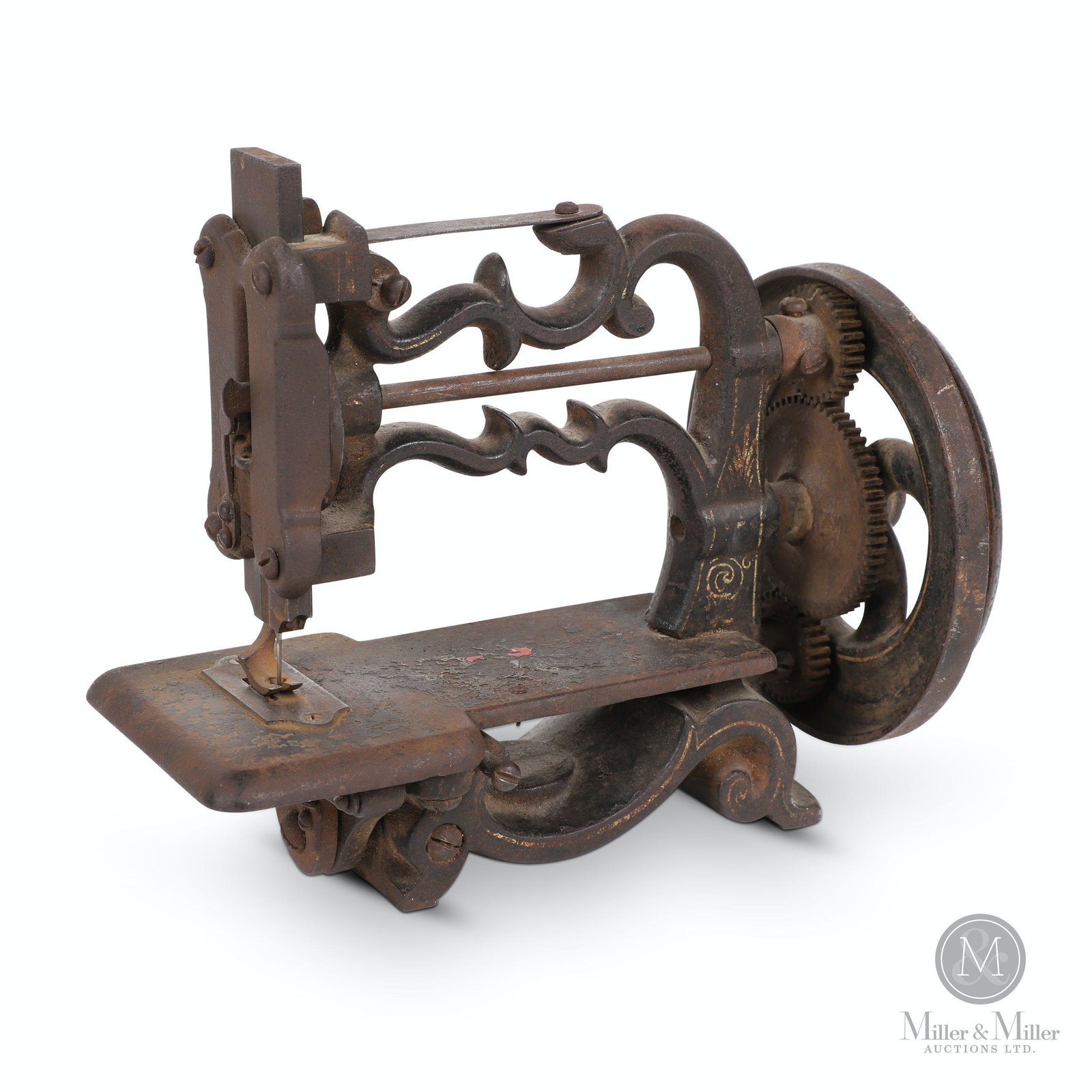 Chas. Raymond, Guelph Sewing Machine: Canadian. 1870s. Ornate cast iron composition. Stamped, "Chas. Raymond". 9 x 4 x 7" (H). Mechanically functioning. Surface exhibits scattered loss, light oxidation. Retains traces of pinstriped decora