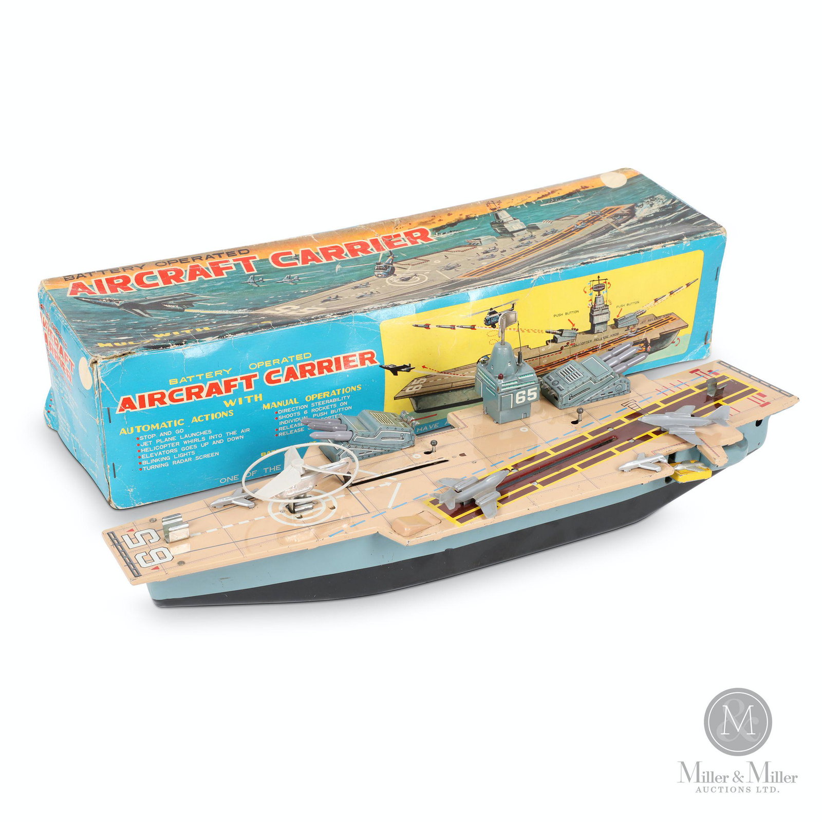 Marx Aircraft Carrier Tin Litho Toy: Japanese. 1960s. Lithographed tin. Features numerous battery-operated features. Marked, "Louis Marx Co. - Made in Japan", battery door. Box 21 x 6 x 4.75". Box exhibits creases, scratches and edge wea