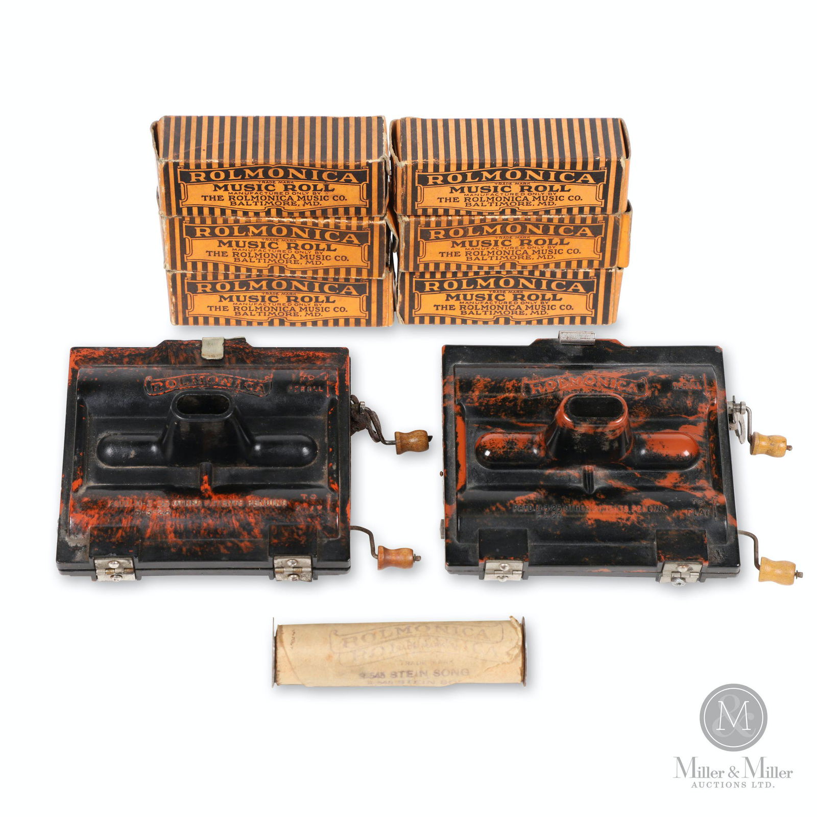"Rolmonica" Harmonica Mouth Organs and Rolls: German. 1920s. Bakelite cases. Includes an assortment of 7 music rolls (6 boxed). Stamped, "Rolmonica Trade Mark Registered", patents to 1928. Harmonica stamped, "Made by Rolmonica Music Co., Made in