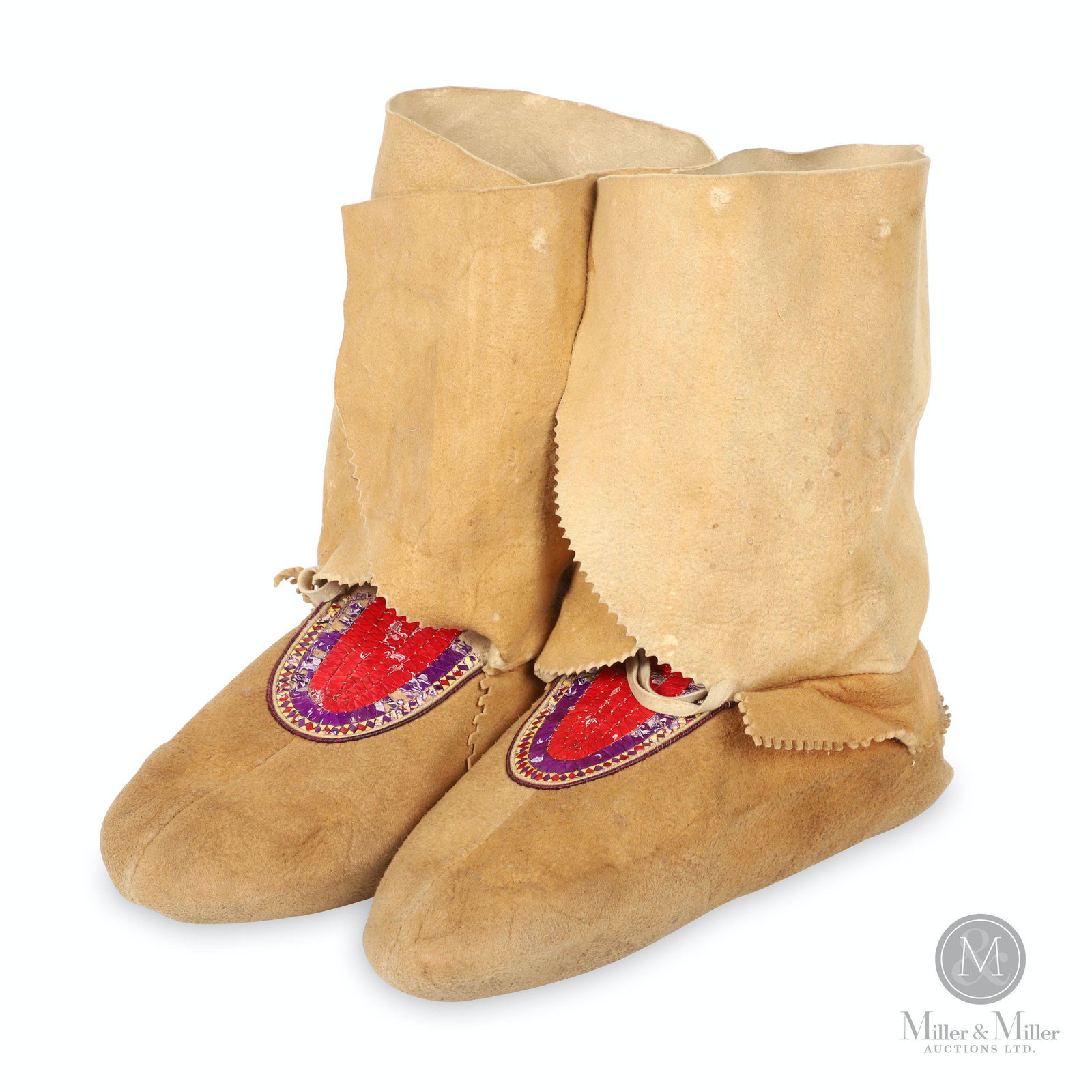 Quill Decorated Moccasins: Quill decorated moccasins with red, purple and white dyed flattened quills. Early 20th century, possibly Eastern Athabascan. H: 9", L: 10", W: 4". CODE:CAN
