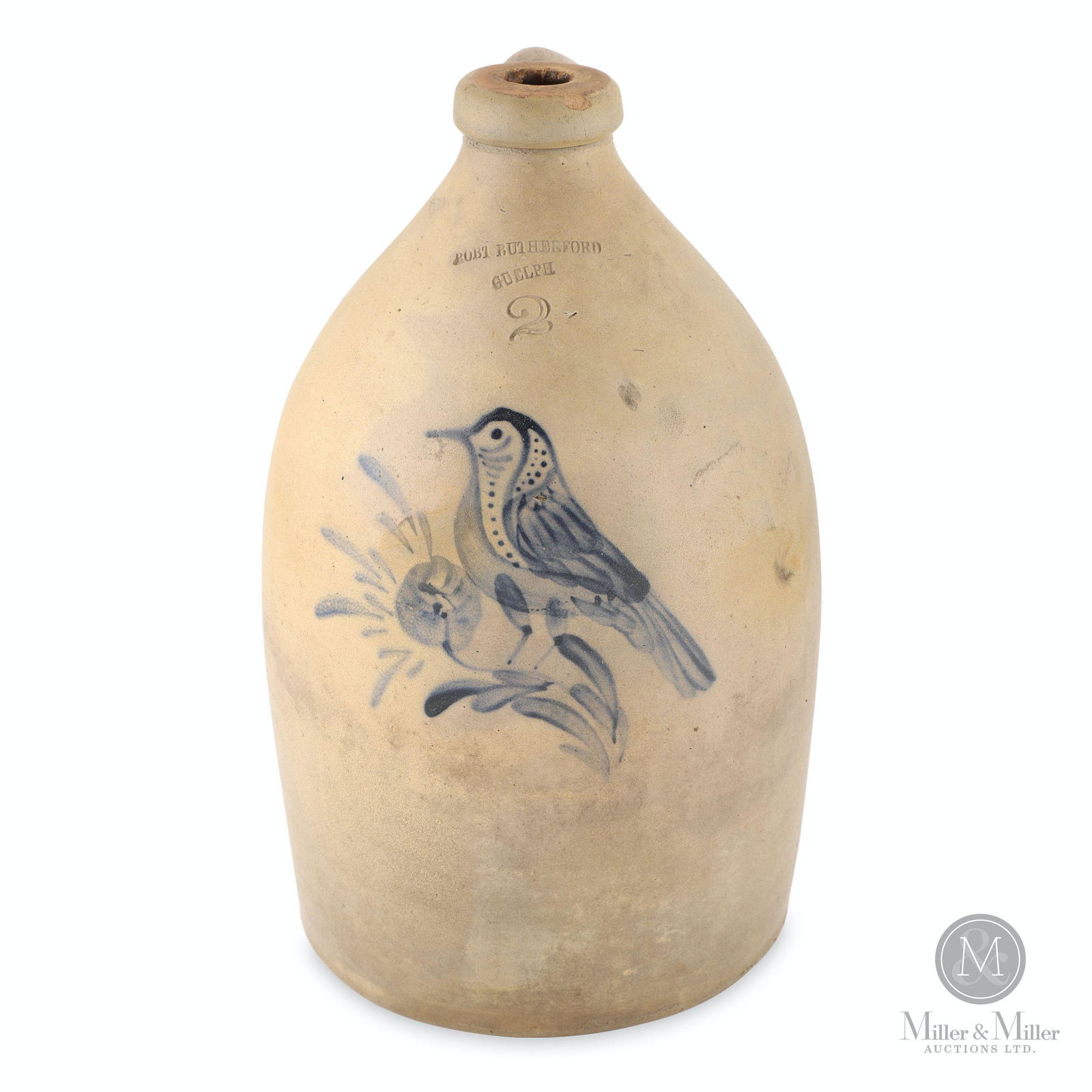 Robert Rutherford, Guelph 2 Gallon Jug: Debossed, "Robt Rutherford Guelph". 14.5 x 9" (diam). Jug manufactured at the Brantford pottery featuring an outstanding bird decoration was made during the tenure of F.P. Goold (1859-1867). A small f