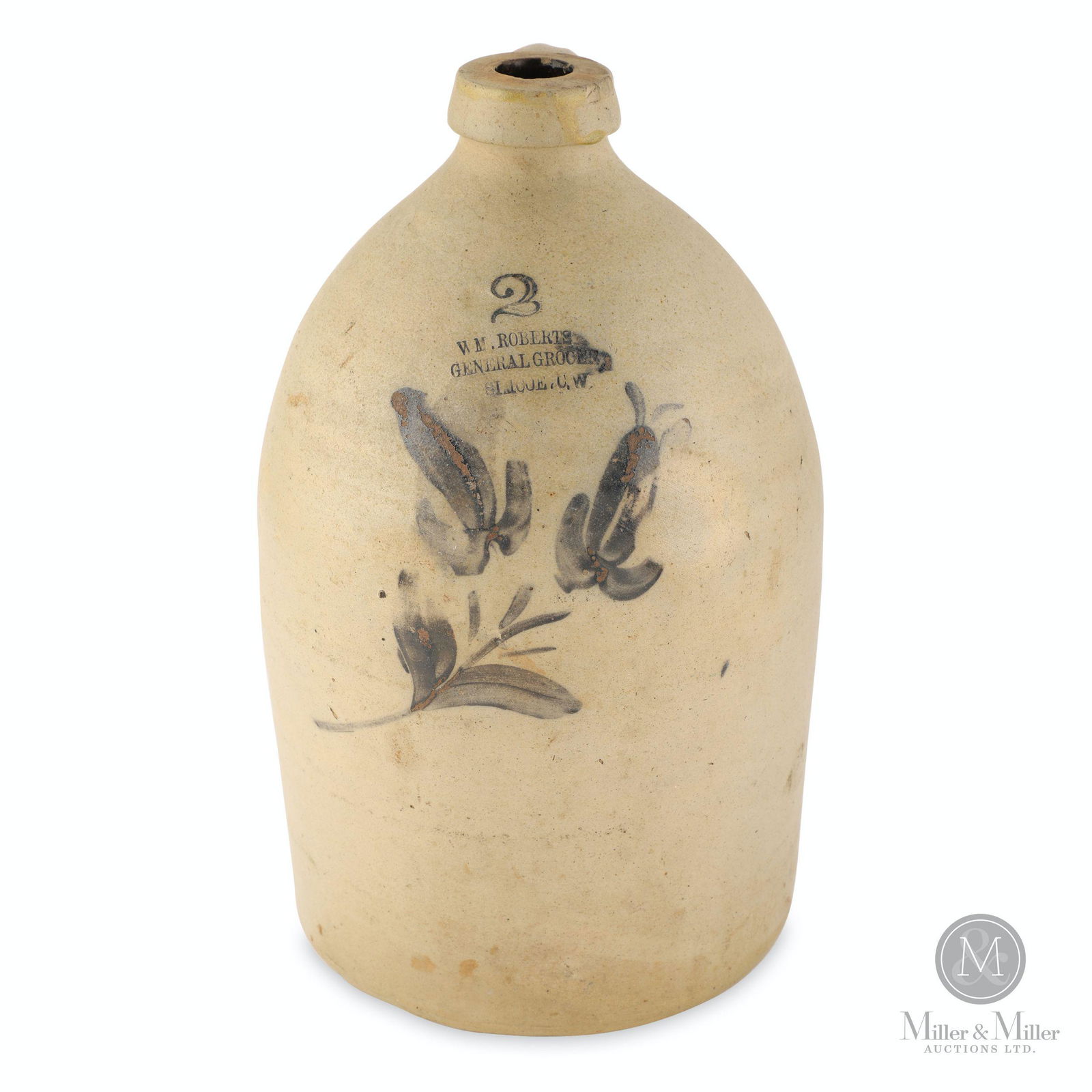 W. M. Roberts, Simcoe, C.W. 2 Gallon Jug: Debossed, "W. M. Roberts General Grocer Simcoe, C. W". 14 x 8" (diam). Three small flakes exist on right side of the lip and a couple of very small chips are evident on the inside top of the jug. A ve