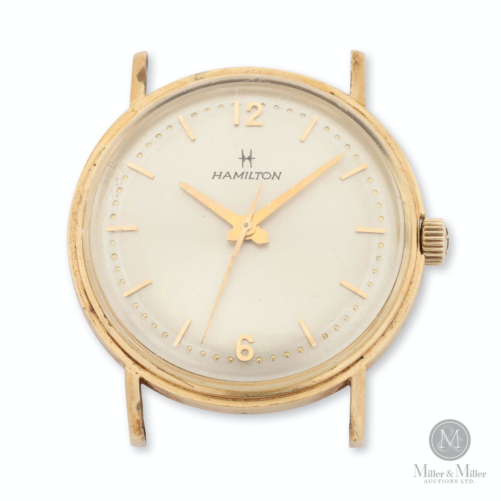 Hamilton, 10K Gentlemen's Dress: American. 1950s. 10K gold case. Gross weight of assembled watch, 20.2g. Hallmarked, "10K Gold Hamilton" caseback. 31mm case diameter. After winding, watch was found to be running at the time of catalo