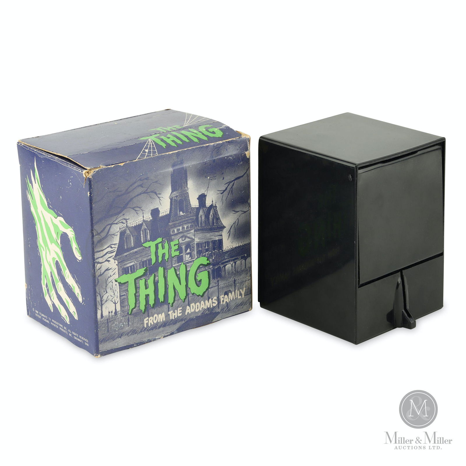 The Addams Family Thing Bank: Japanese. 1960s. Plastic with metal components. With original box. Box marked, "Made in Japan - Copyright 1964 Filmways TV Productions Inc., All Rights Reserved Patents Pending Poynter Products, Inc.