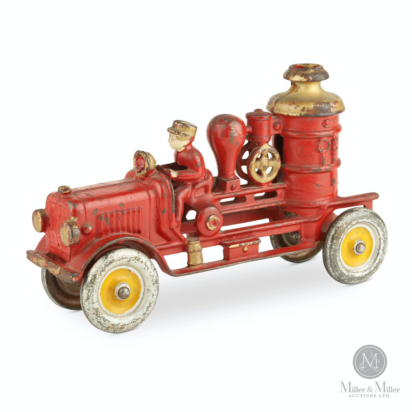 Kenton, Cast Iron Fire Pumper: American. 1930s. Painted cast iron. 5 x 8 x 2 1/2". Exhibits general wear and paint loss on the wheels. Scattered paint chips and wear evident in much of the red and gold paint. CODE:TOY Bryan Beatty 
