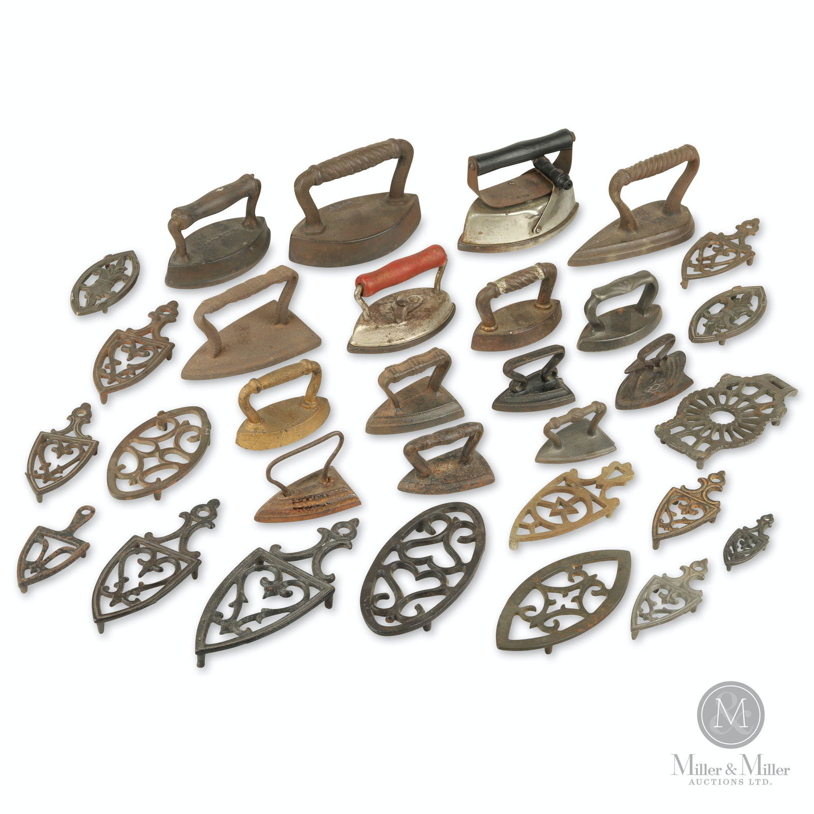 Cast Iron Toy Sad Irons: Sixteen (16) Trivets, 15 Irons. 1890s-1920s. Painted and nickel plated cast iron. 2 to 4 1/4" in length. Some examples exhibit minor surface oxidation. CODE:TOY