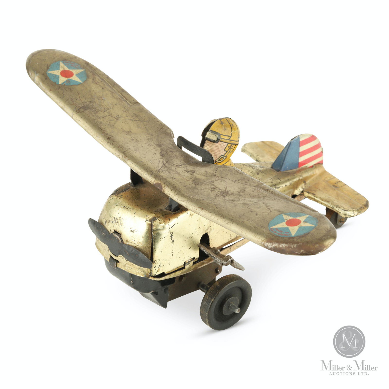 Marx, Wind-up Flip-Over Airplane: American. 1930. Lithographed tin. Marked, "Made in U.S of America" top wing. 4 x 7 1/2 x 5". Mechanically functioning. CODE:TOY Bryan Beatty collection.