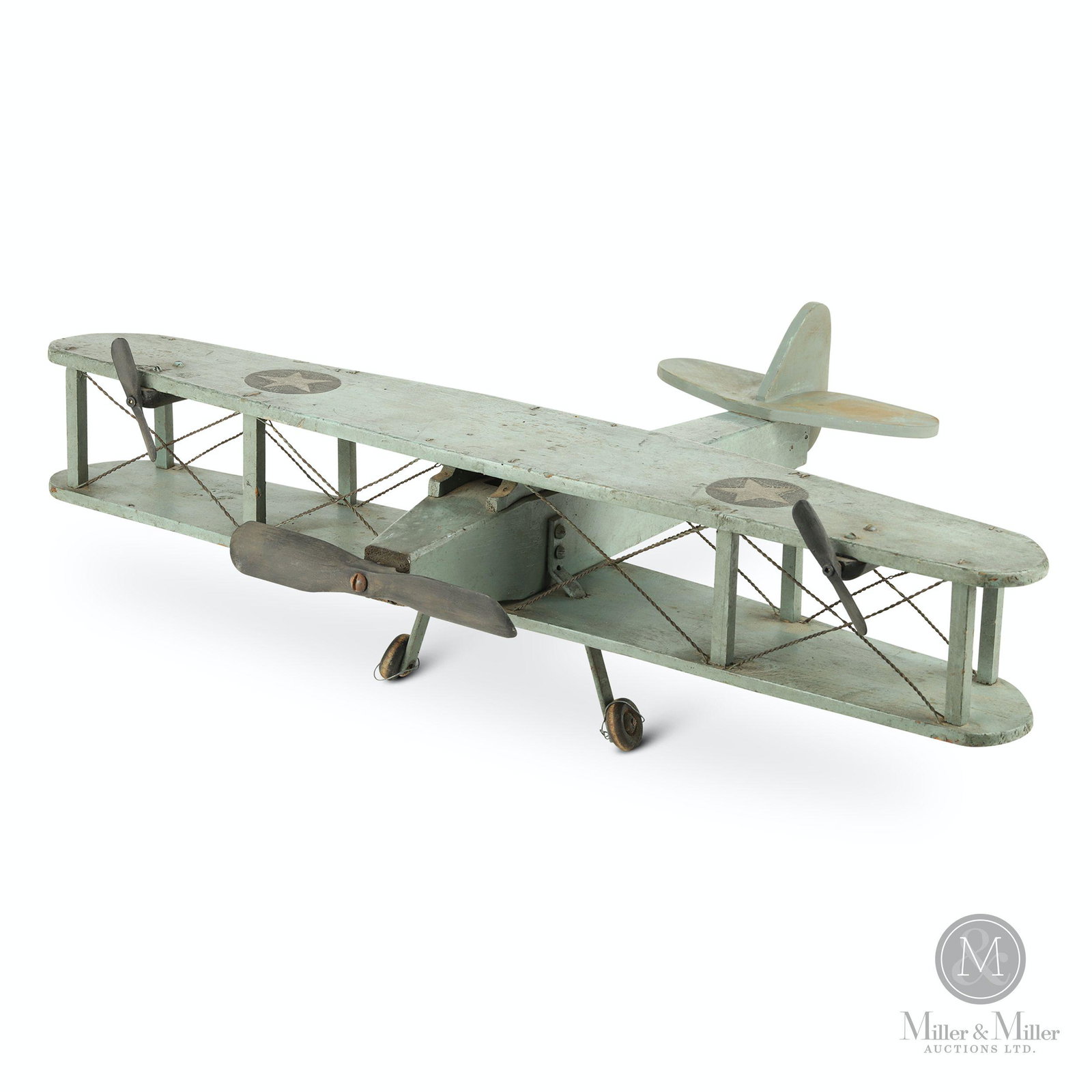 B-10 Bi-plane Painted Wood Toy: American. 1940s. Painted wood. 6 x 21 x 16". Professionally replaced tailfin assembly. CODE:TOY