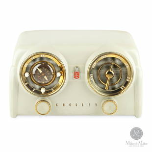 Crosley D-25 Dashboard Clock Radio: Canadian. 1950s. Painted plastic with gilt metal trim. Marked, "Crosley Radio & Television Division Avco of Canada Toronto, Ontario" rear. 7 3/4 x 13 x 6 3/4". Functioning. CODE:RAD