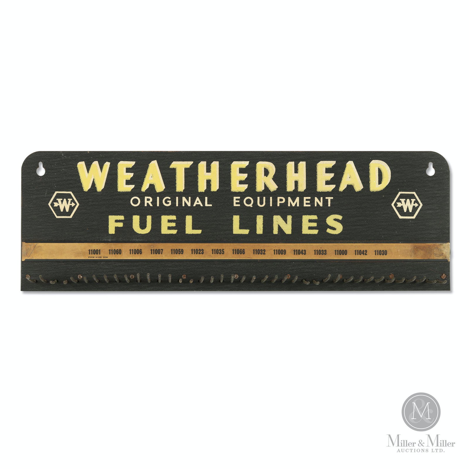Weatherhead Fuel Lines Dealer Display: American. 1950s. Screened metal. 7 x 21 1/2 x 2 1/4". Exhibits very fine spots of overpaint to the left and right sides of the sign. Dirt and light staining evident on the paper insert strip and a lit