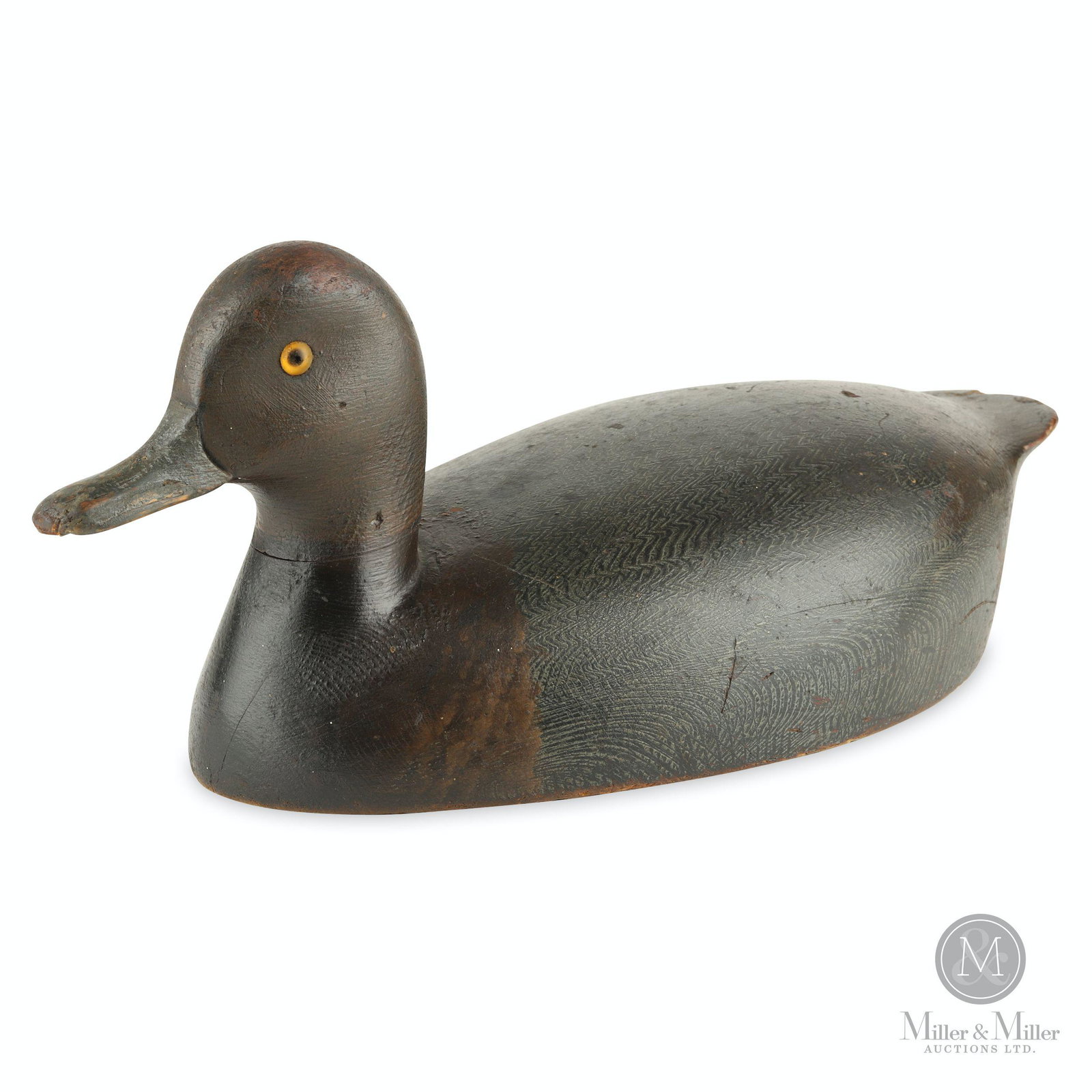 Toronto School, Solid Body Drake Redhead: Canadian. Very well carved and painted Toronto School Redhead decoy, circa 1920, with original comb painting and skilled paint blending. Some bill and tail wear. The decoy exhibits a J.R. Wells or Tom