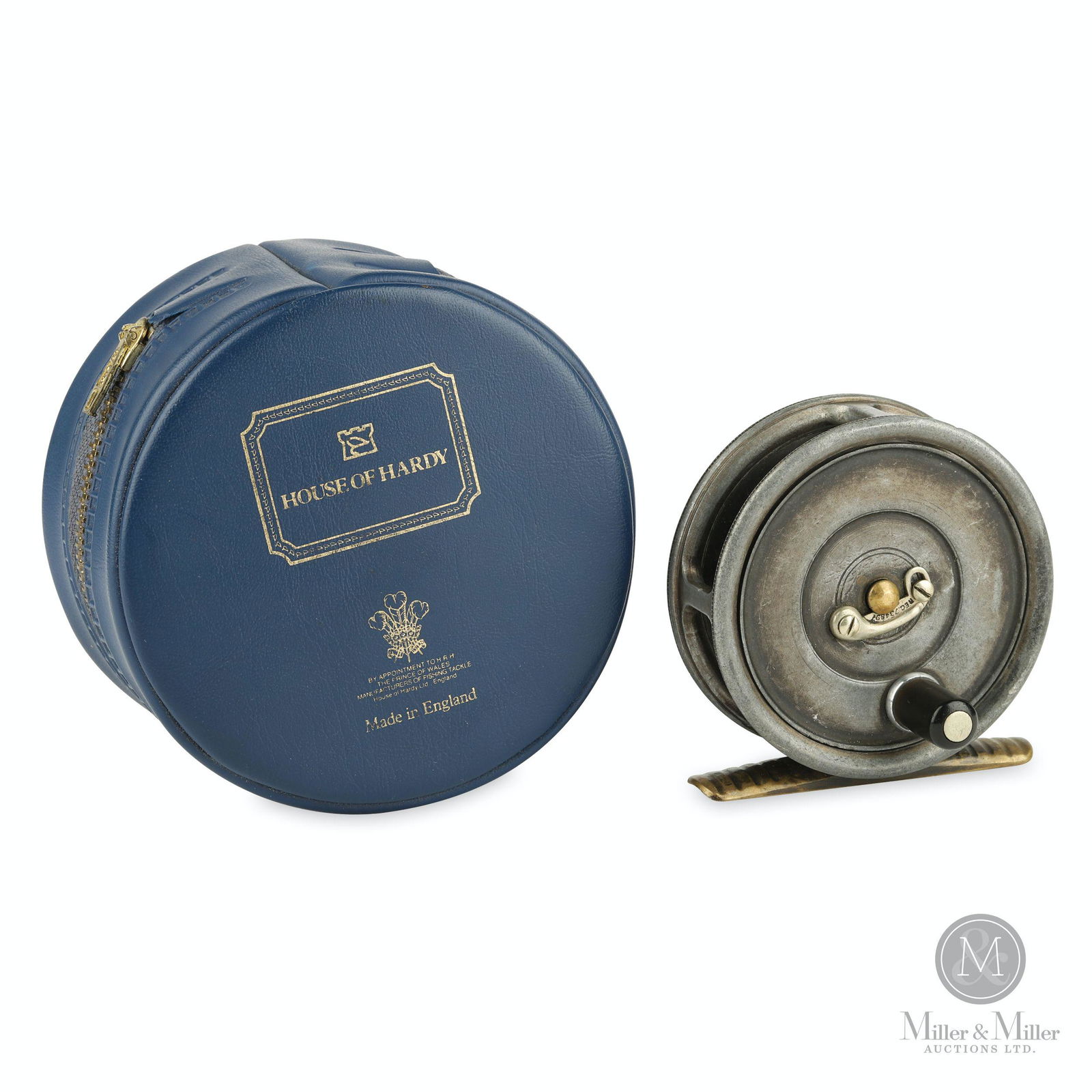 Hardy Bros., Uniqua Mark II 2 5/8" Fly Reel: English. Circa 1922-1959. The smallest model made by Hardy. Narrow drum. Features constant check and no drag control. Telephone latch. Ribbed brass foot. Ebonite grasp. Stamped, "Pat Nos 145904 & USA