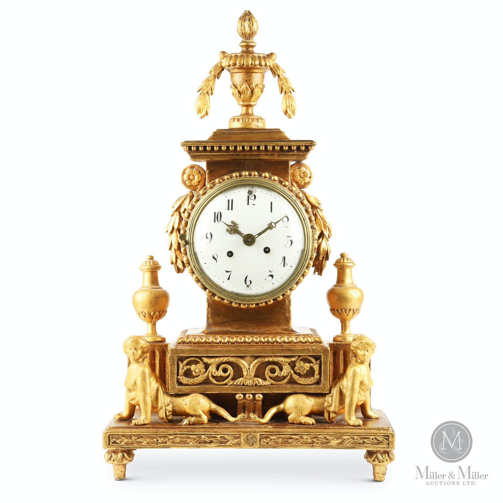 Swedish Empire Mantle Clock: Swedish. Gilt carved wood. Features flanking fable animals. 23 x 13 1/2 x 5 1/4".